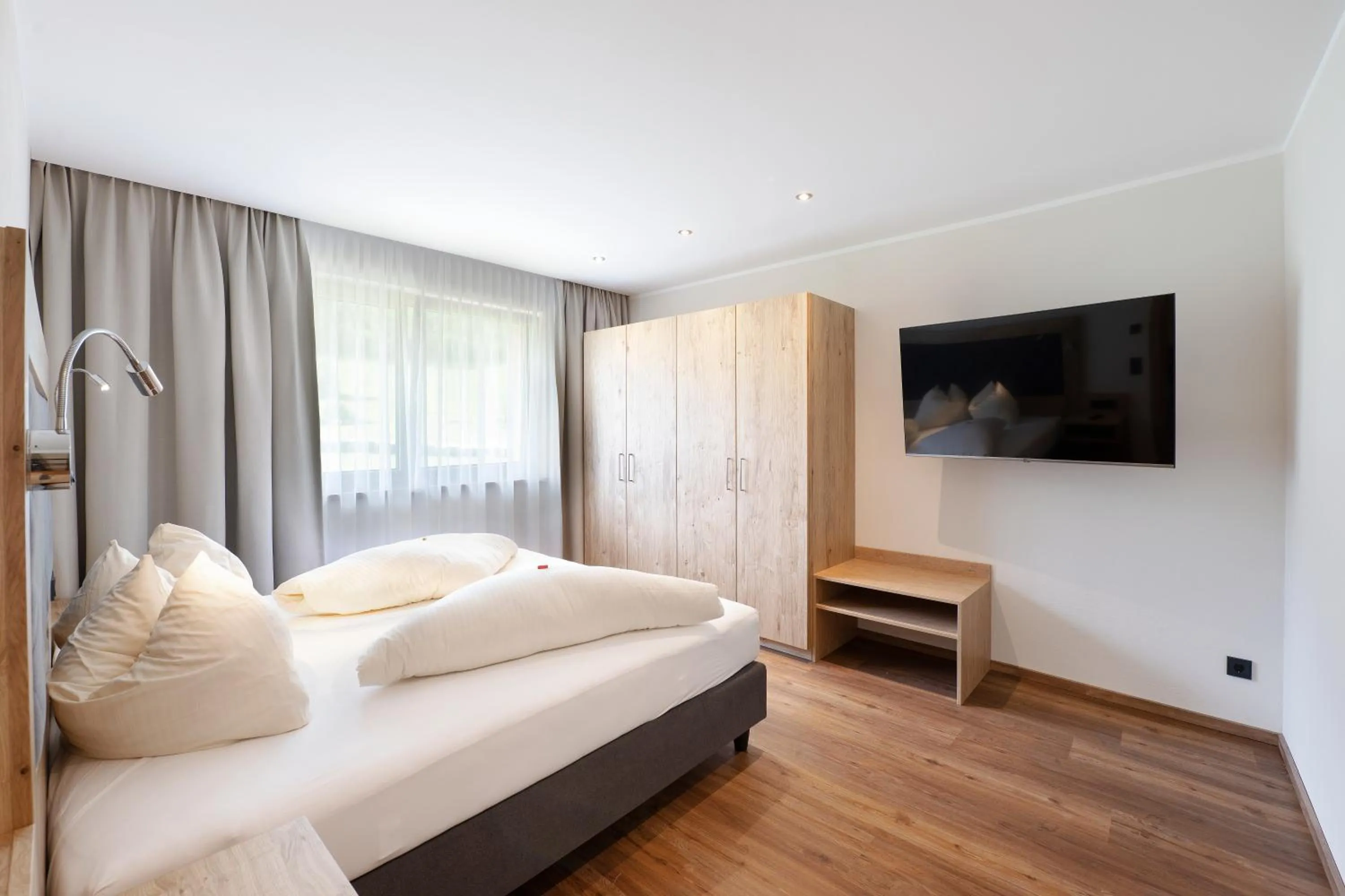 Photo of the whole room, Bed in Golf- und Sporthotel Moarhof