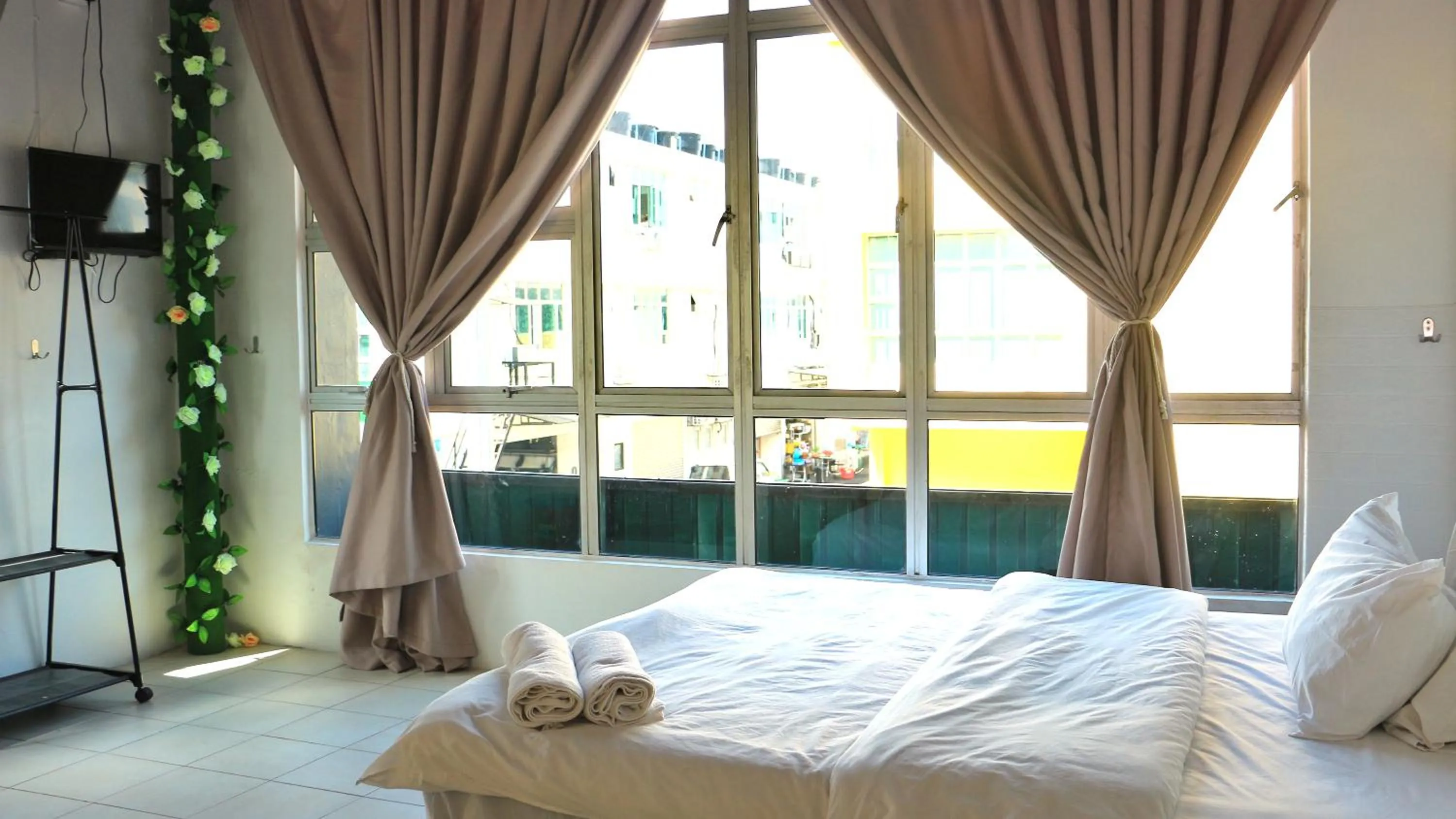 Bed in Ihome Boutique Hotel