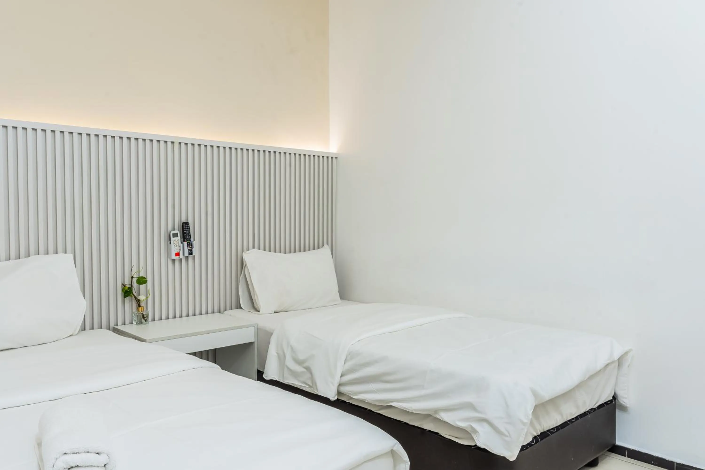 Bed in Ihome Boutique Hotel