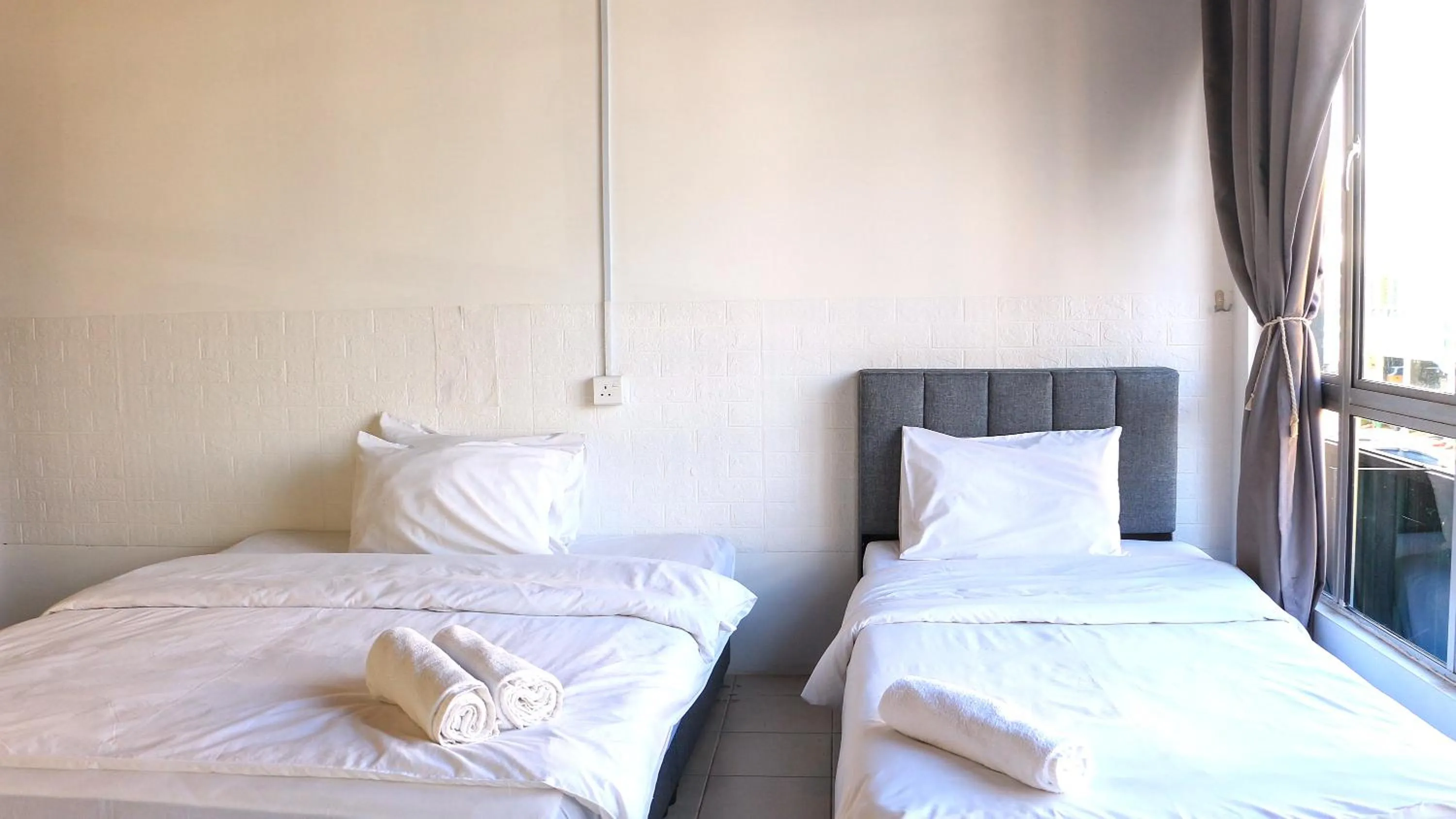 Bed in Ihome Boutique Hotel