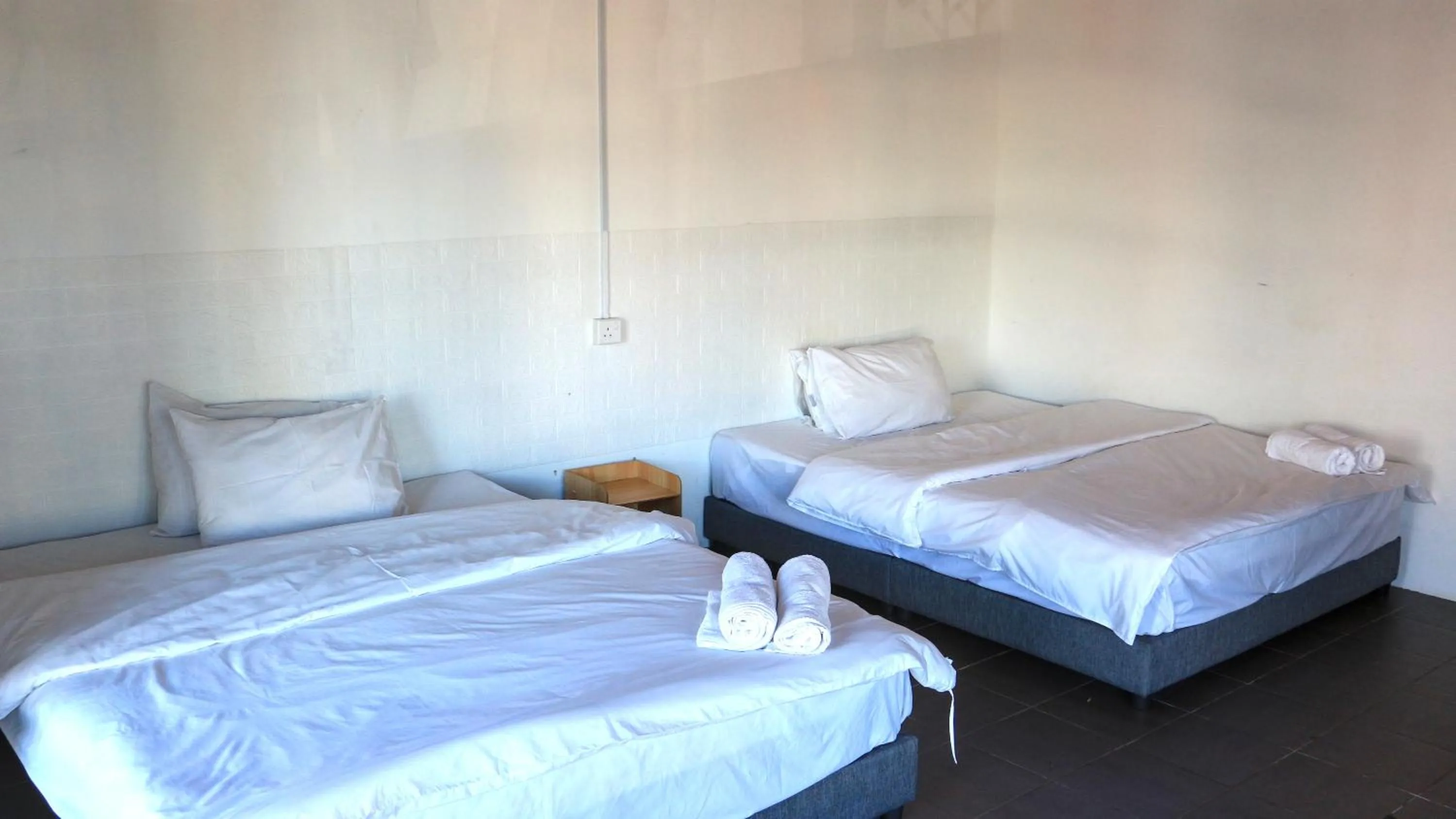 Bed in Ihome Boutique Hotel