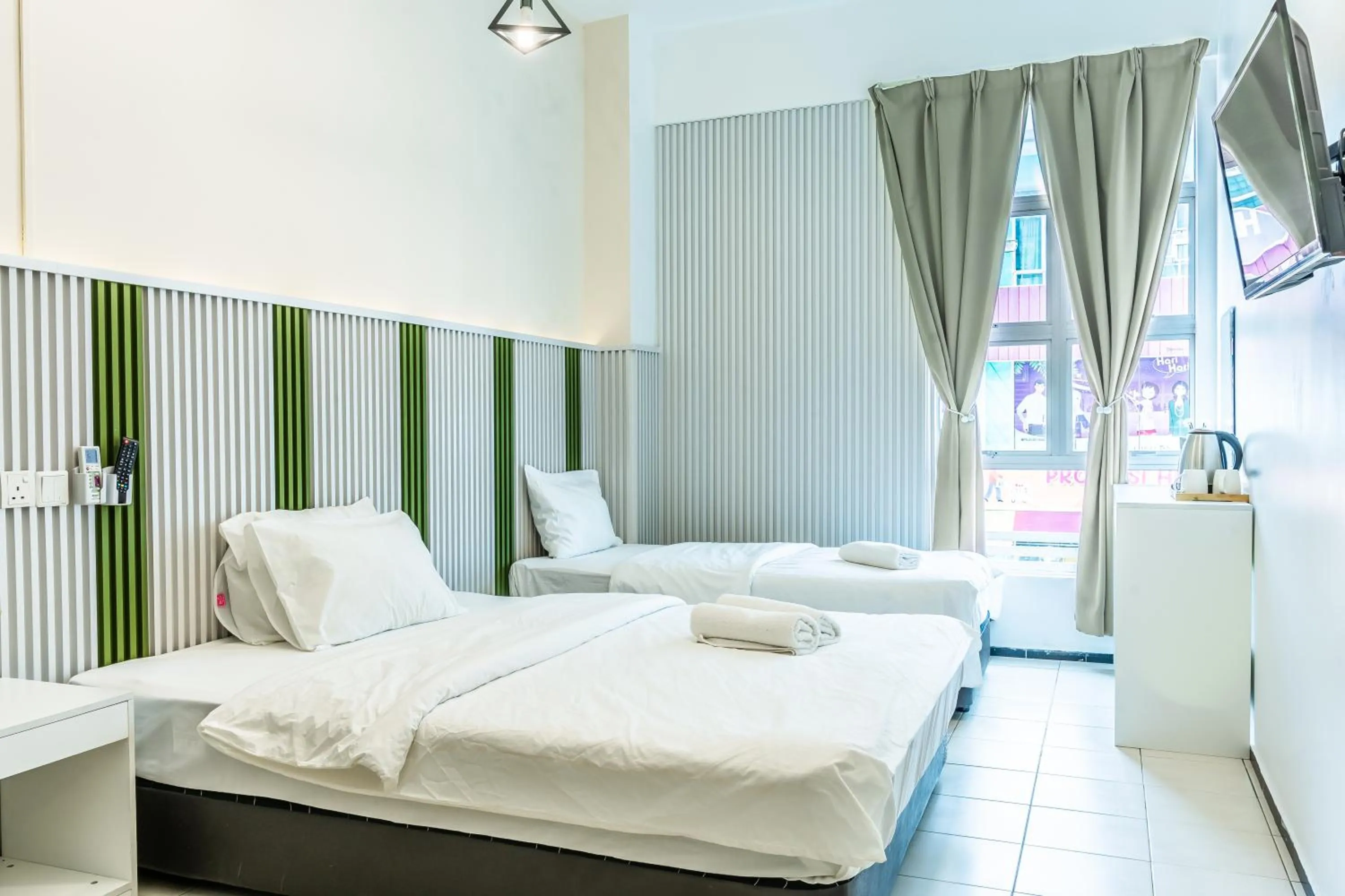 Bed in Ihome Boutique Hotel