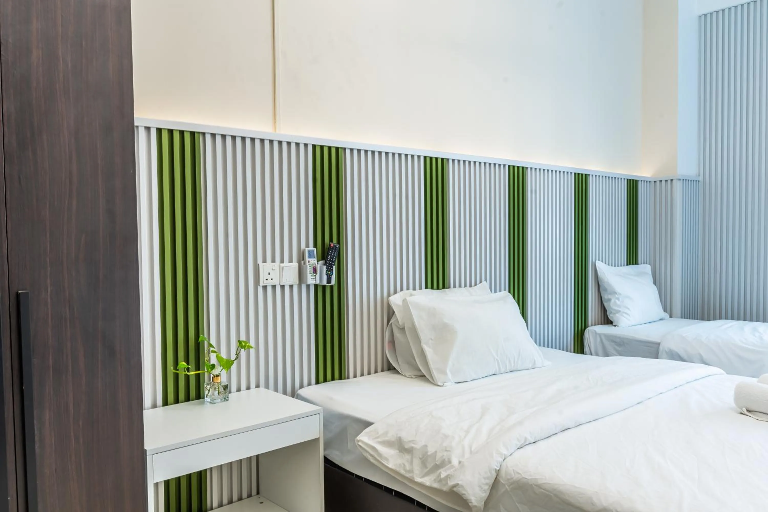 Bed in Ihome Boutique Hotel