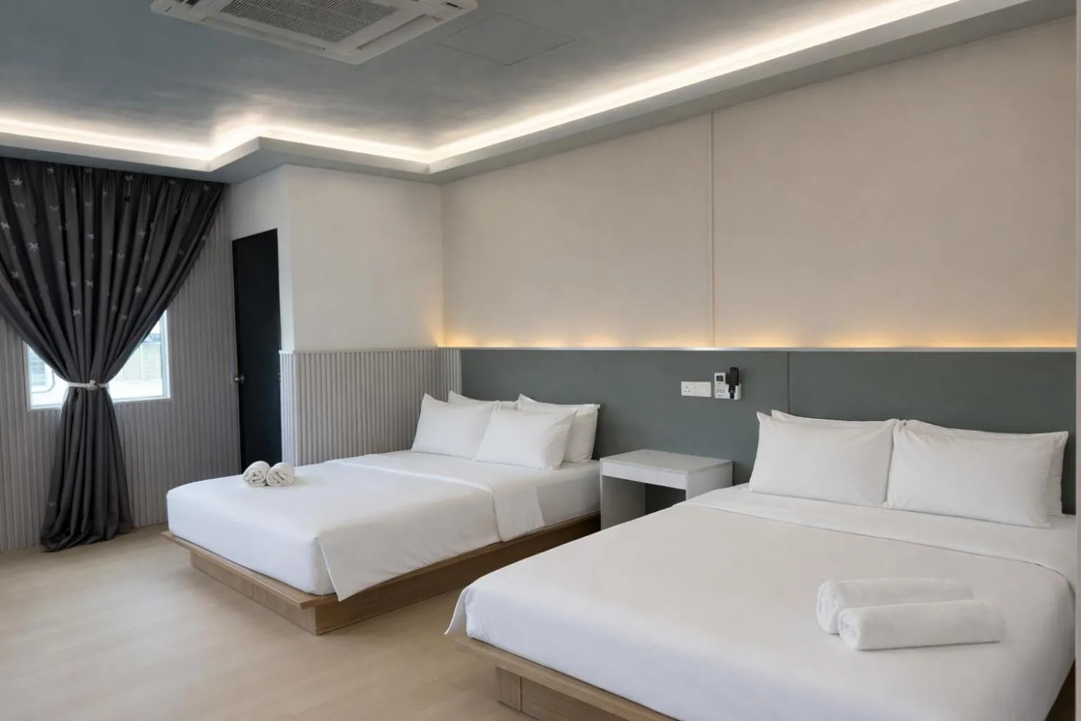 Bed in Ihome Boutique Hotel