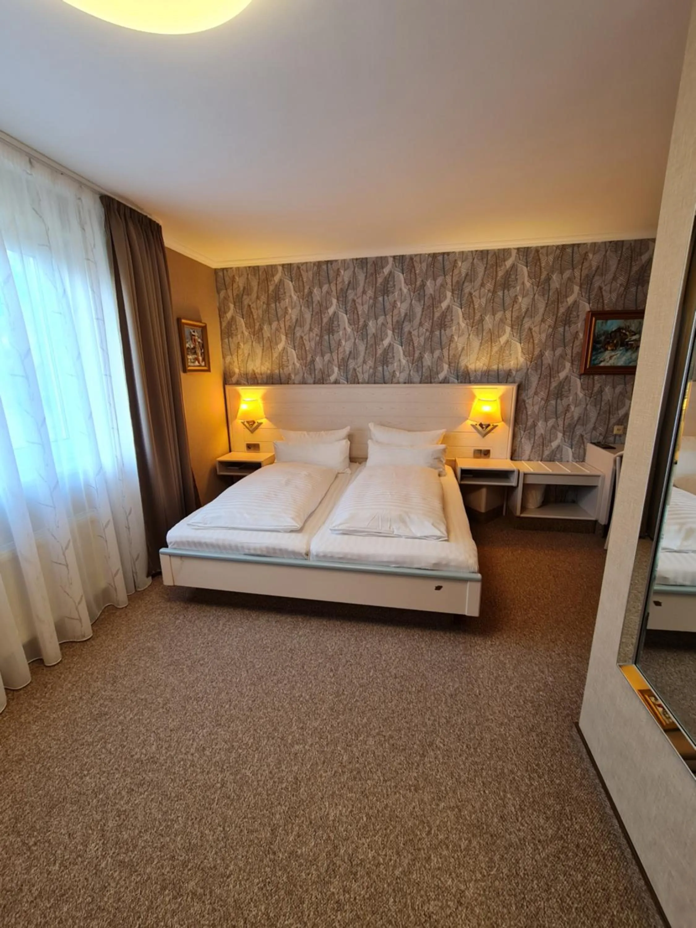 Bed in Ambiente Hotel garni