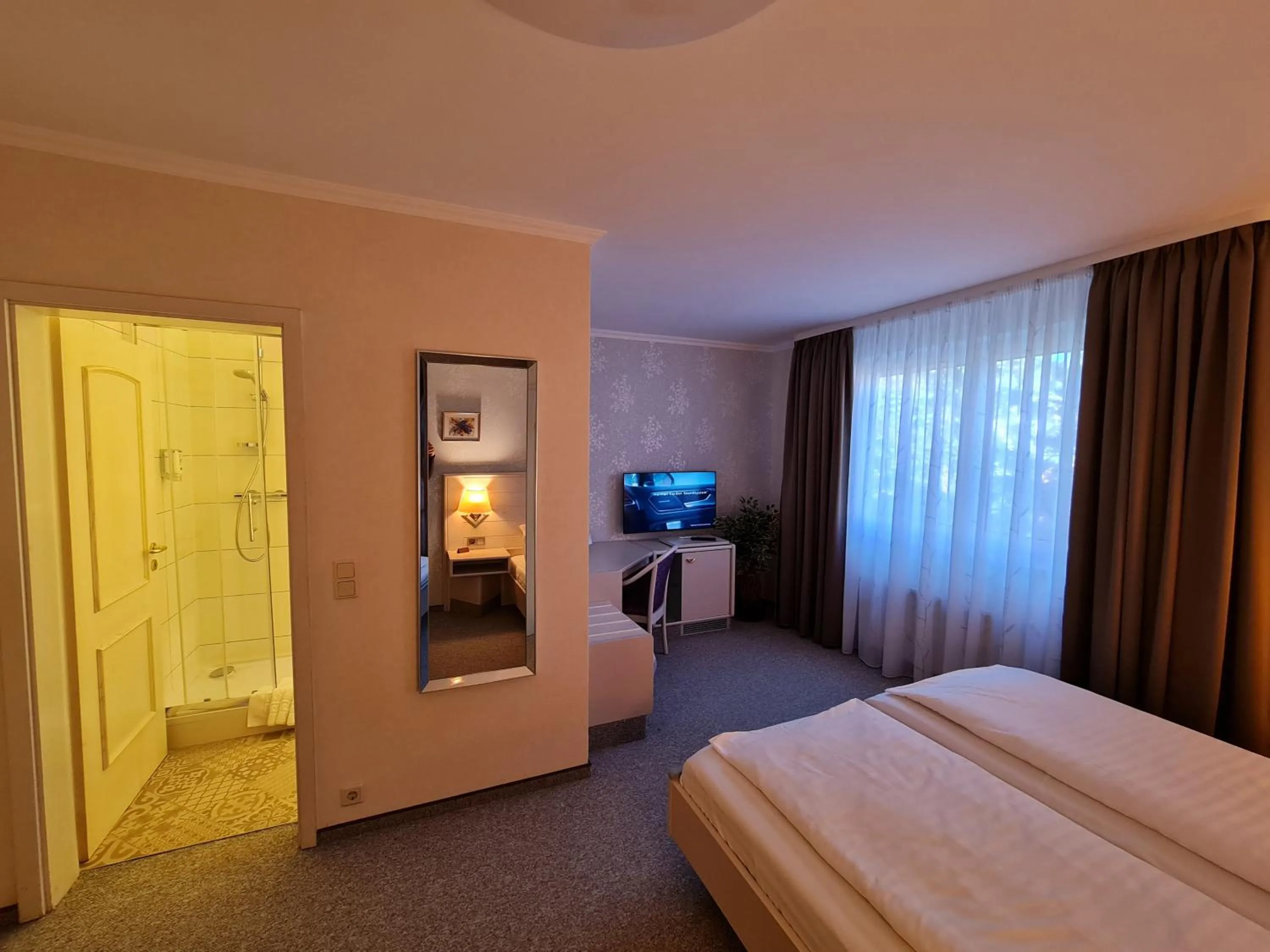 Bed in Ambiente Hotel garni