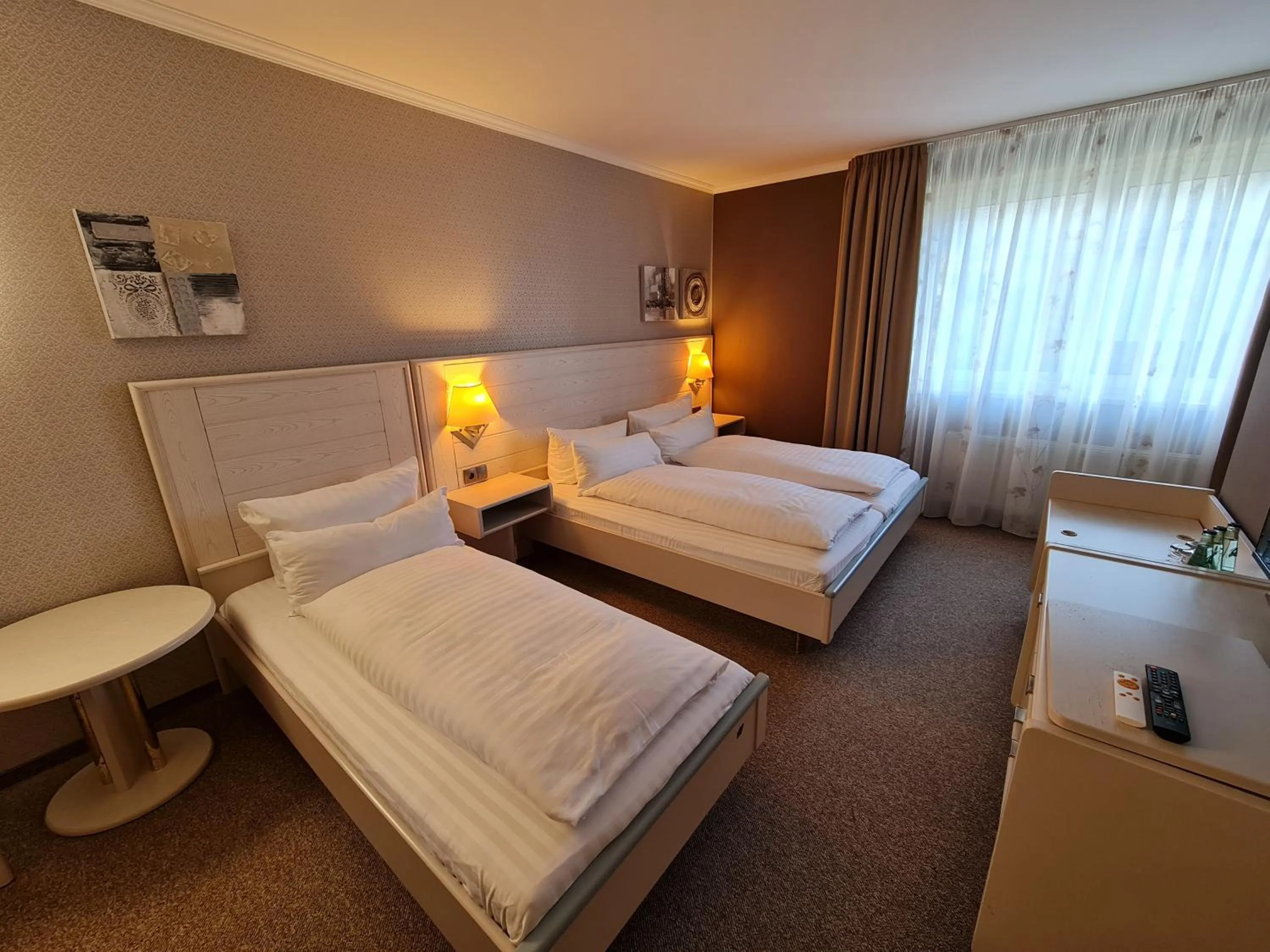 Bed in Ambiente Hotel garni