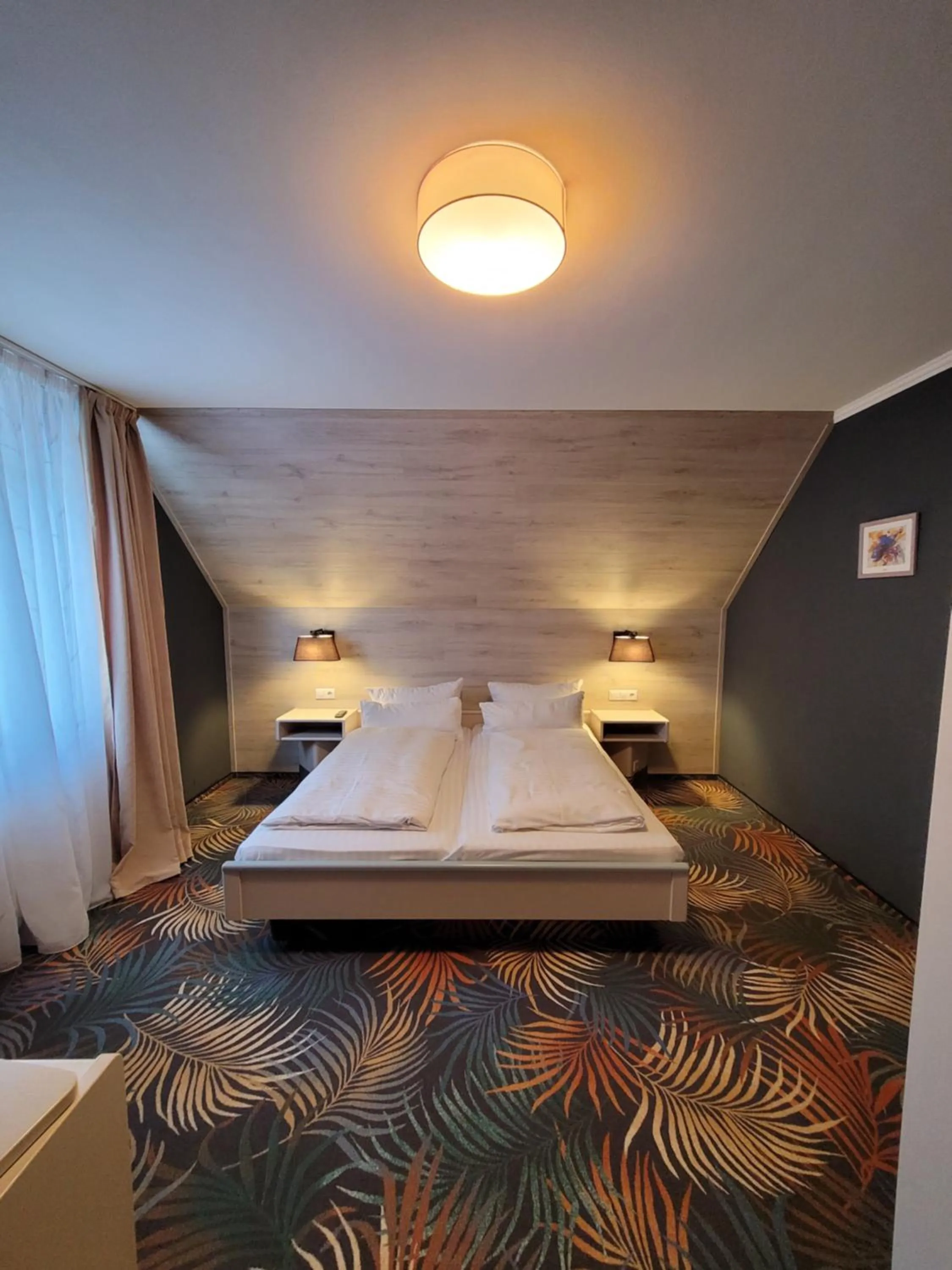 Bed in Ambiente Hotel garni