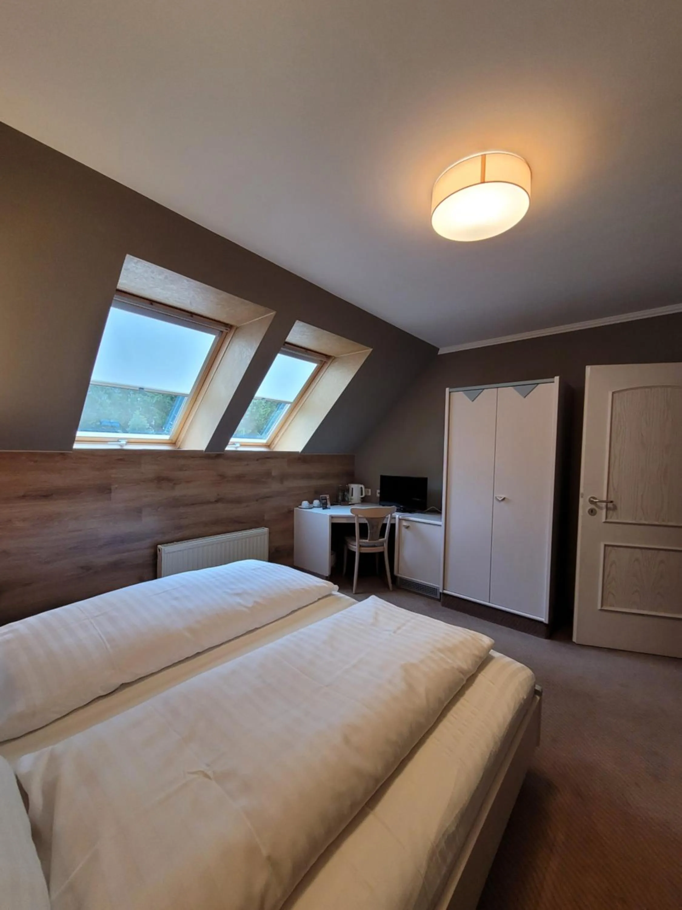 Bed in Ambiente Hotel garni