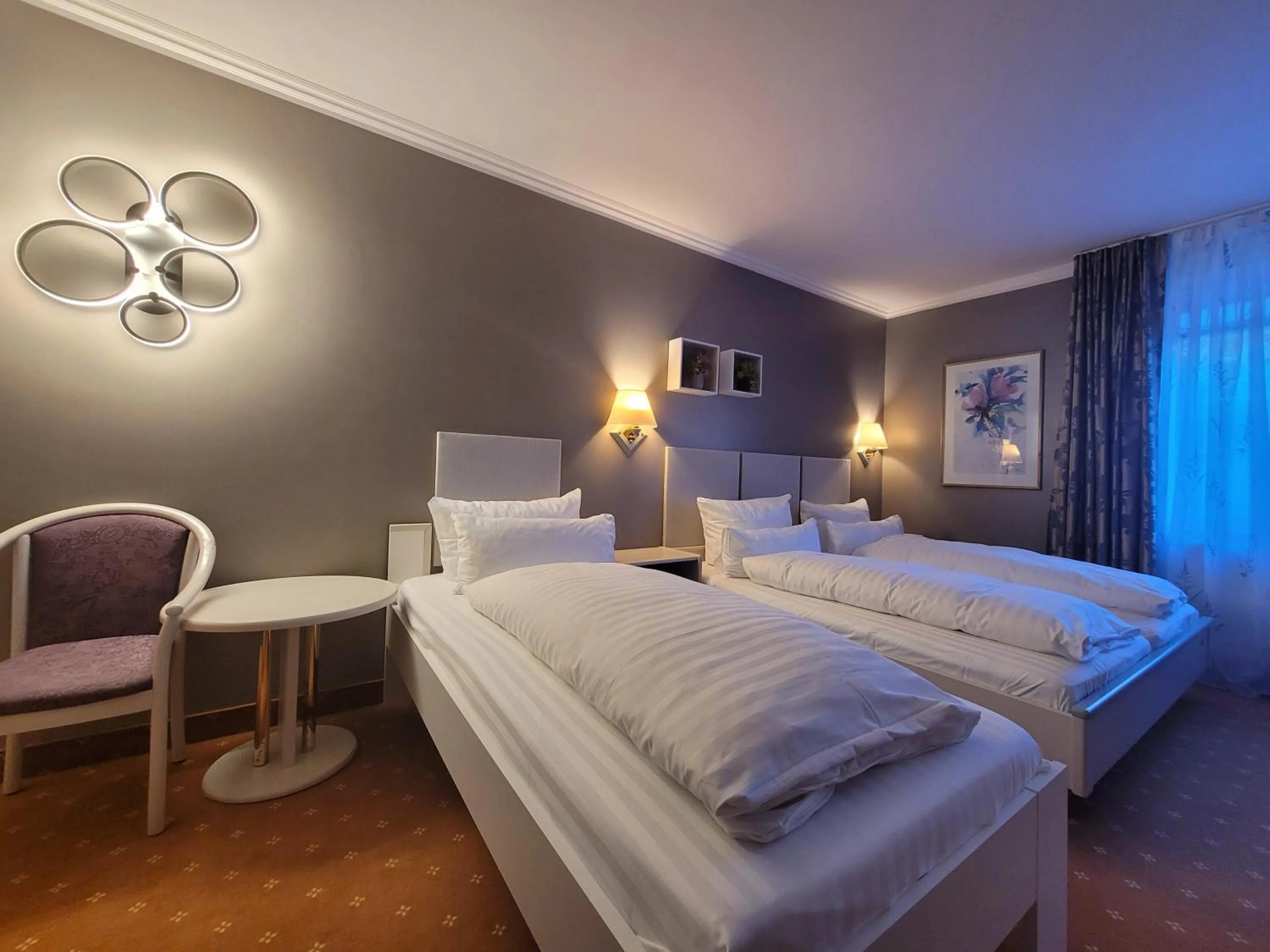 Bed in Ambiente Hotel garni