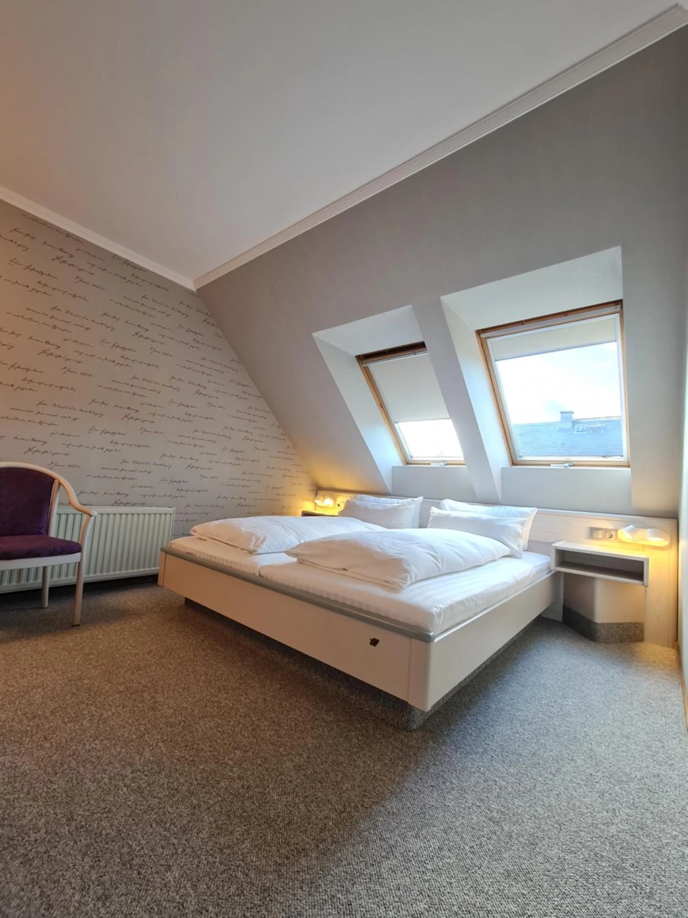 Bed in Ambiente Hotel garni