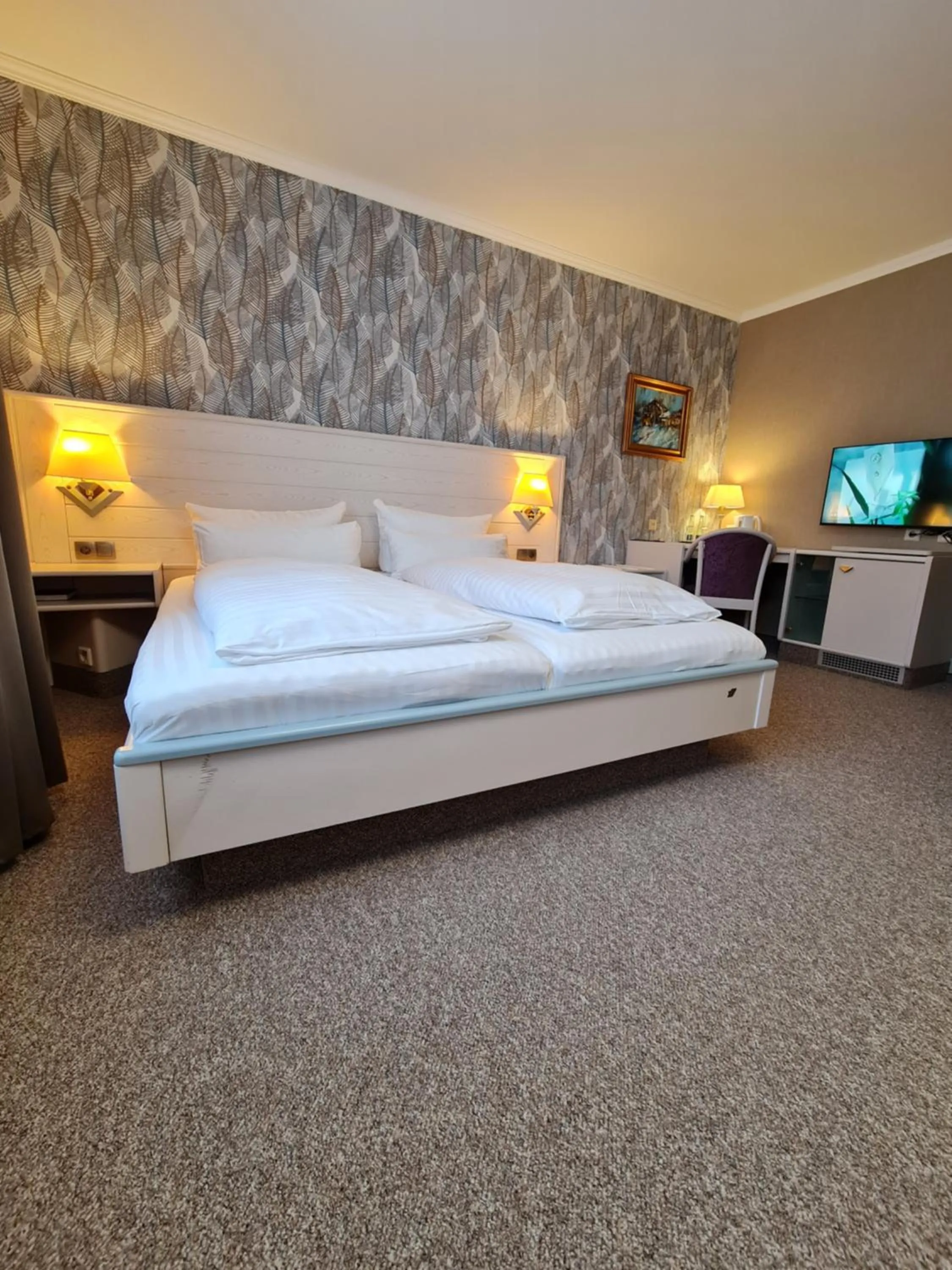 Bed in Ambiente Hotel garni