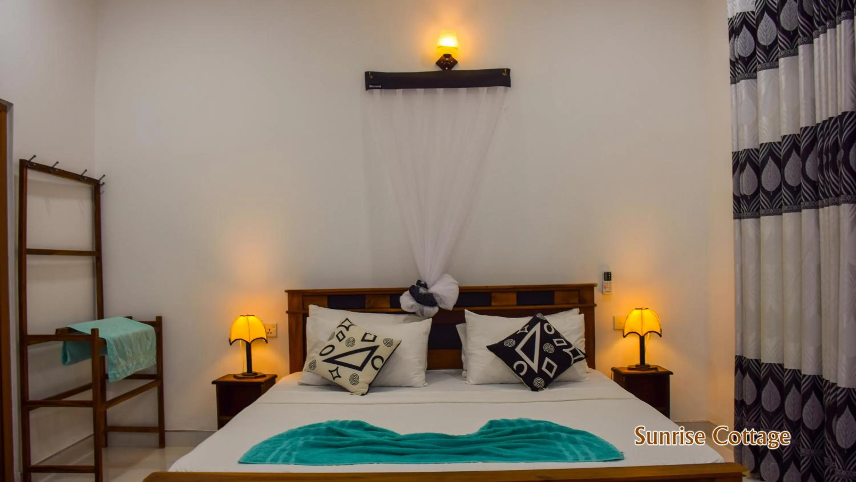Bed in Sunrise Cottage