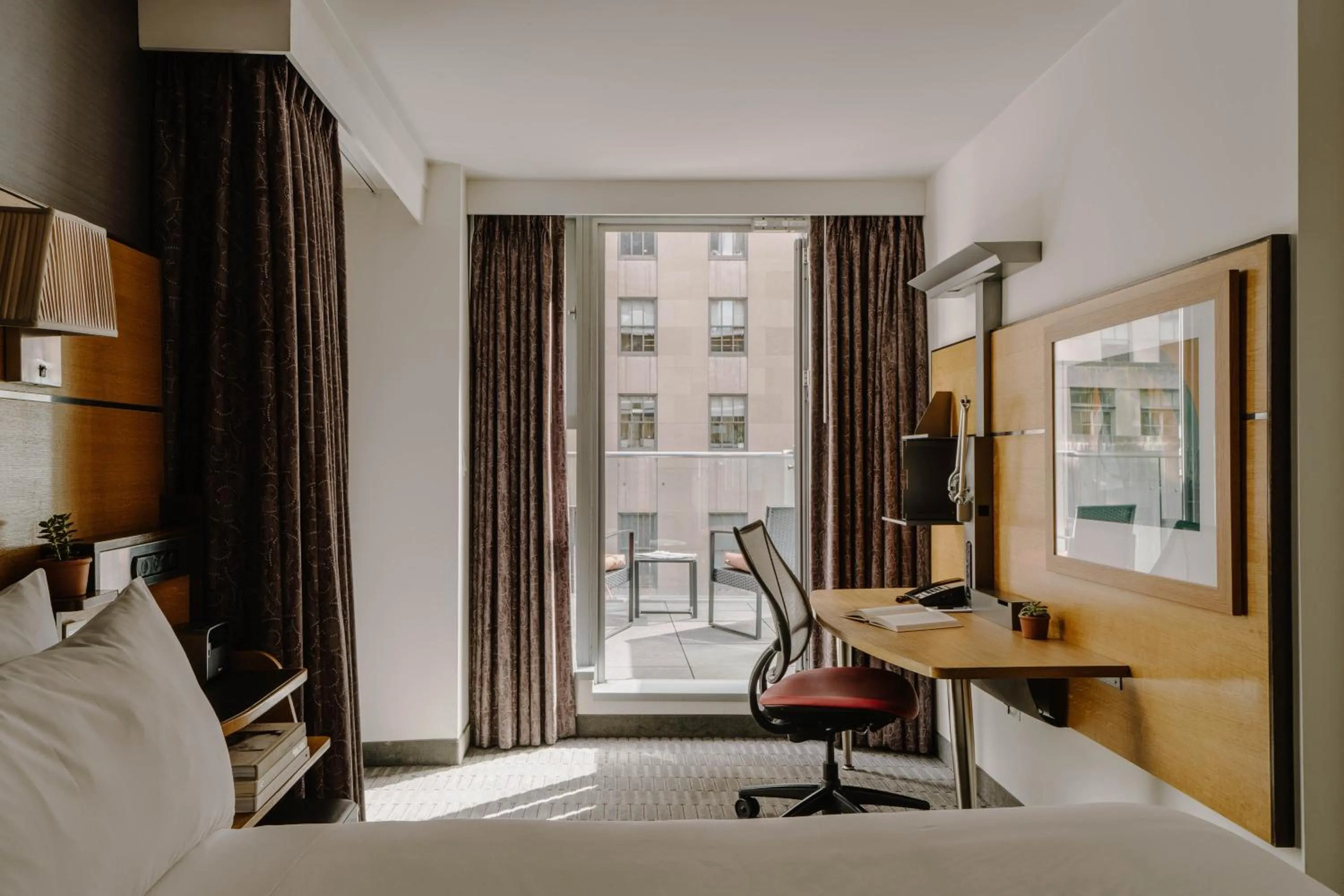 Bed in The Jewel Hotel, New York