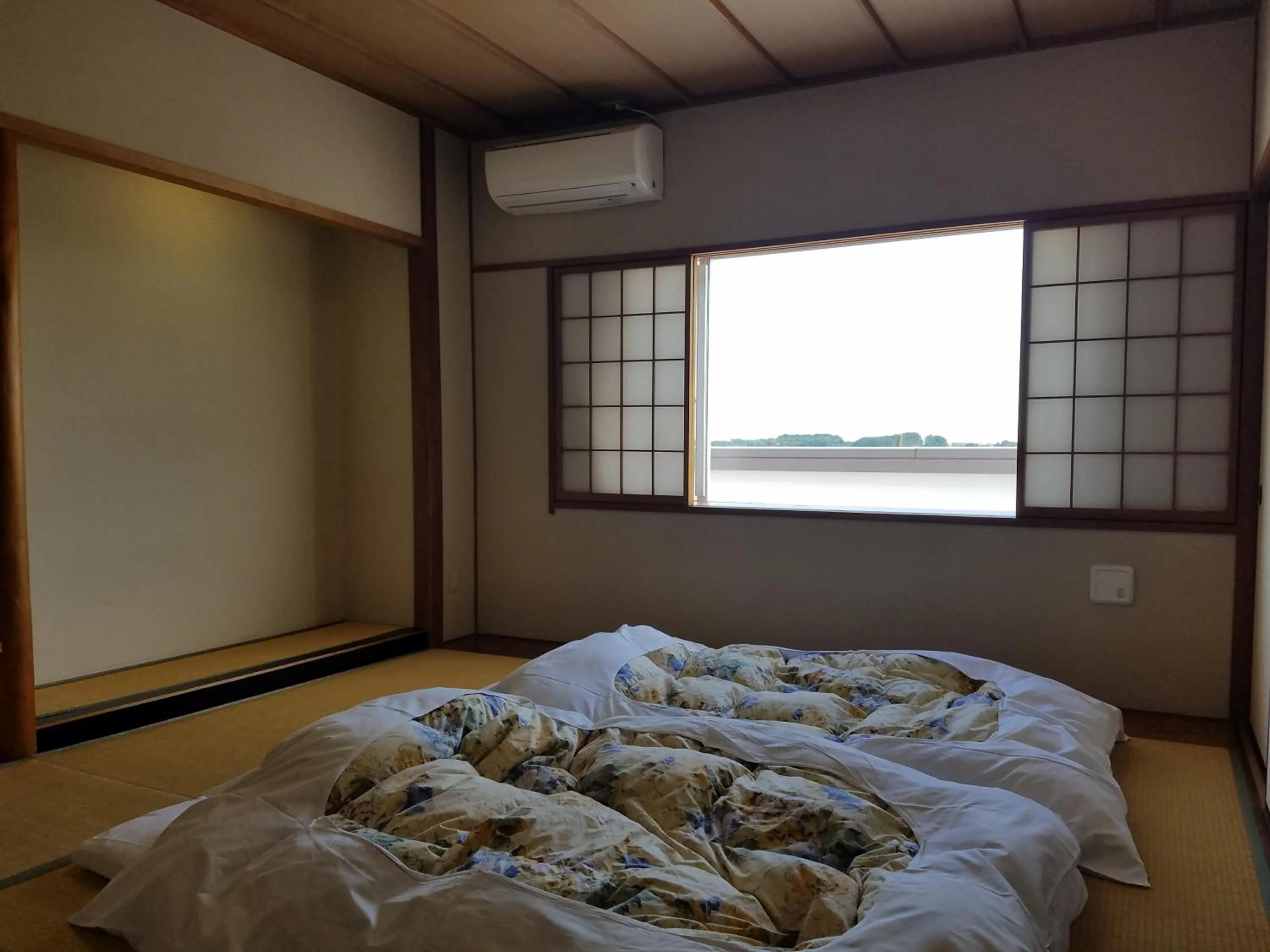 Bed in Hotel Grand Plaza Urashima