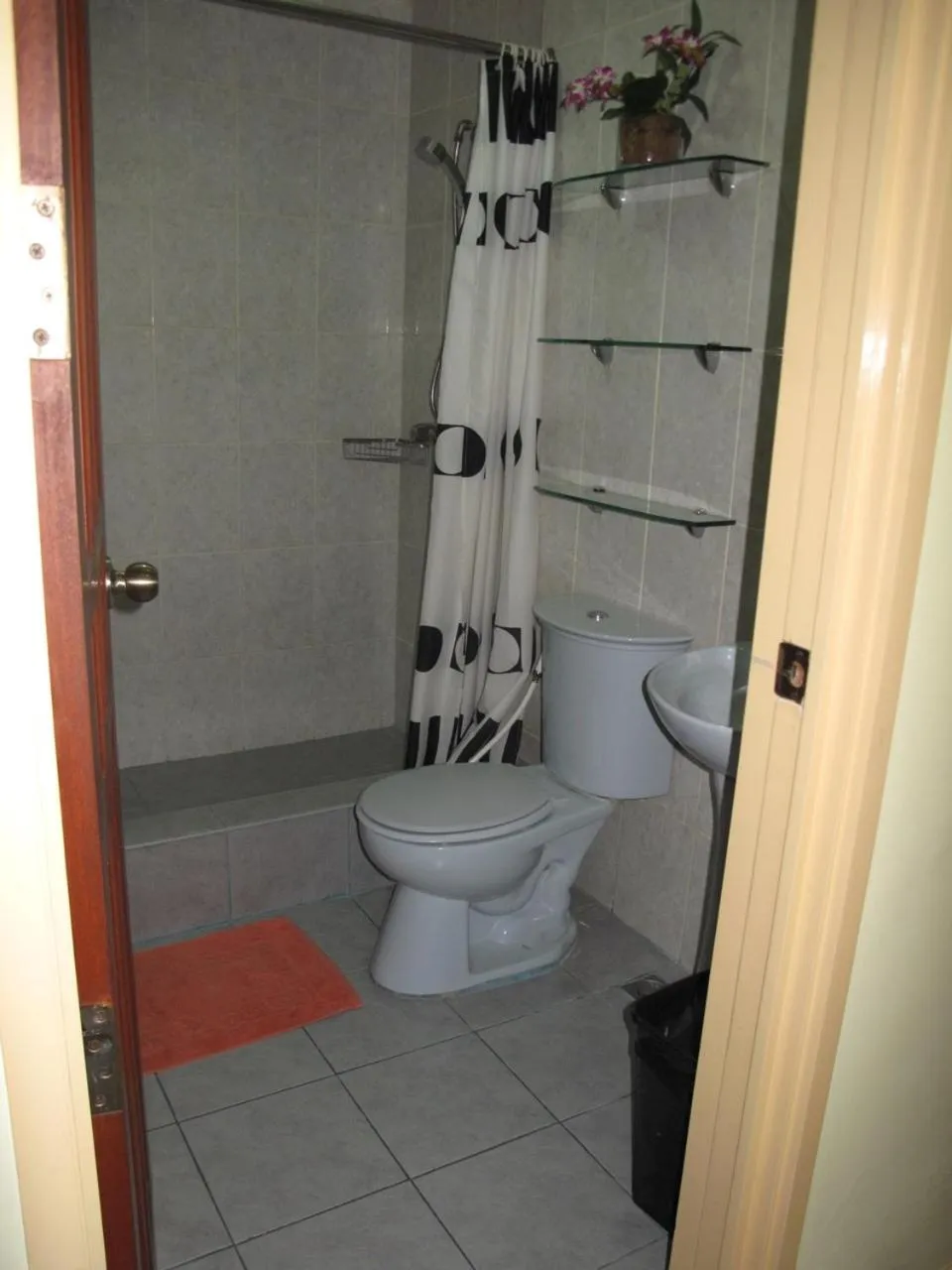 Bathroom in Makati Suites at Travelers Inn