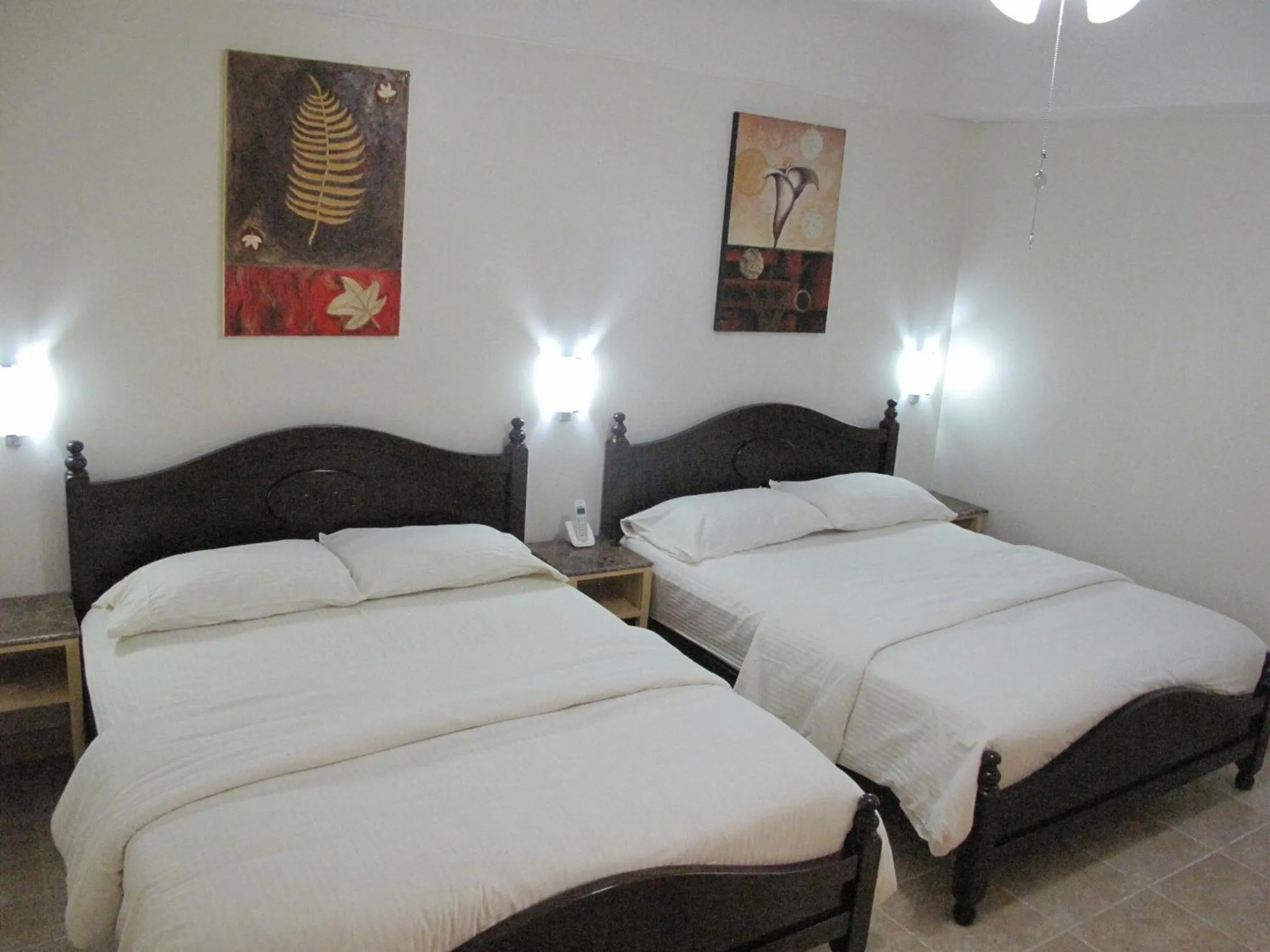 Bedroom, Bed in Makati Suites at Travelers Inn