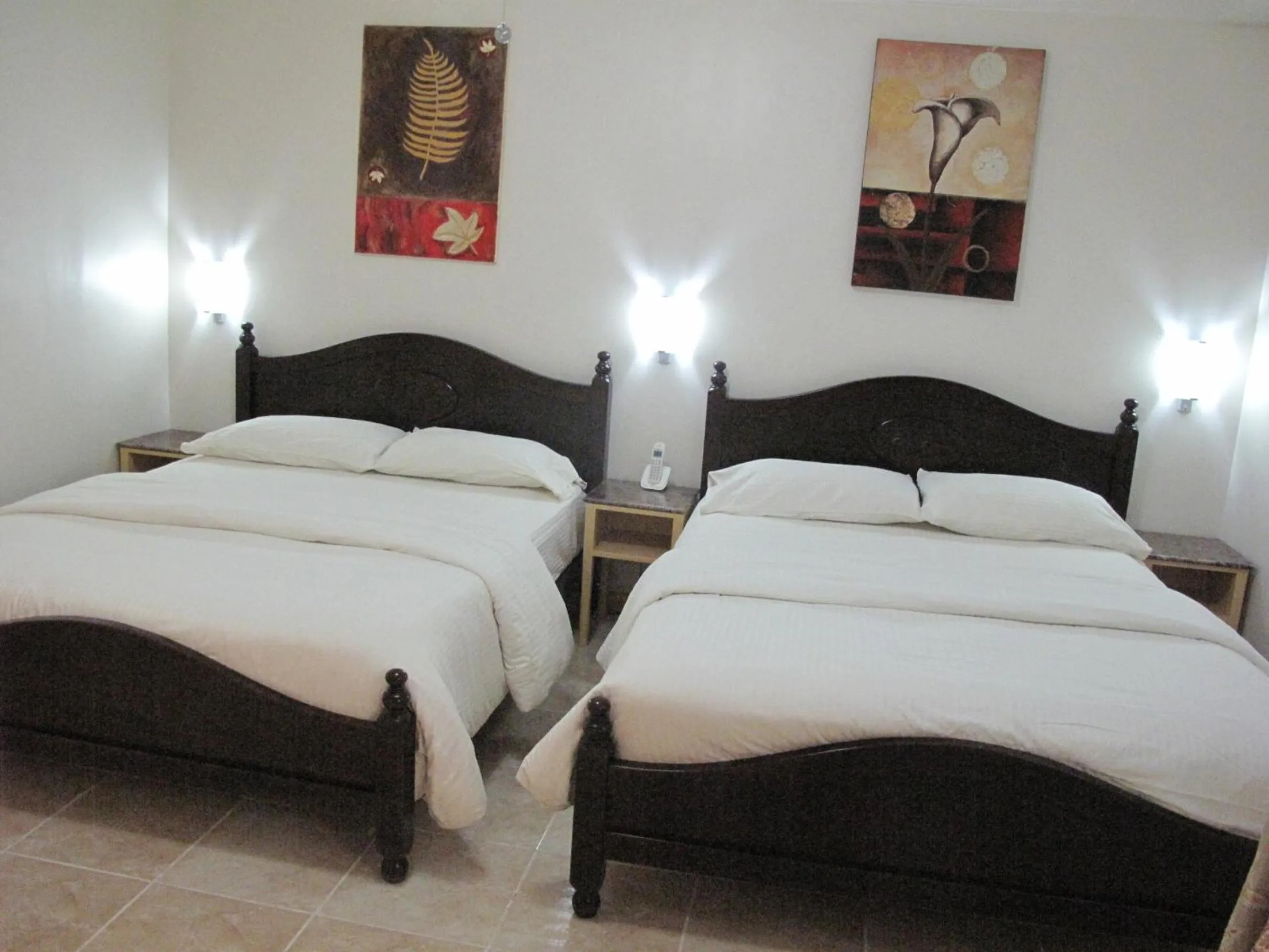 Bed in Makati Suites at Travelers Inn