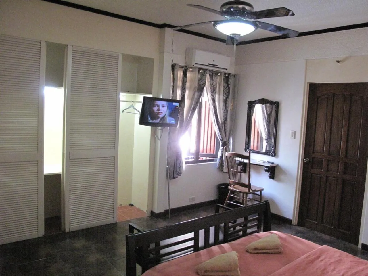 Bed in Makati Suites at Travelers Inn