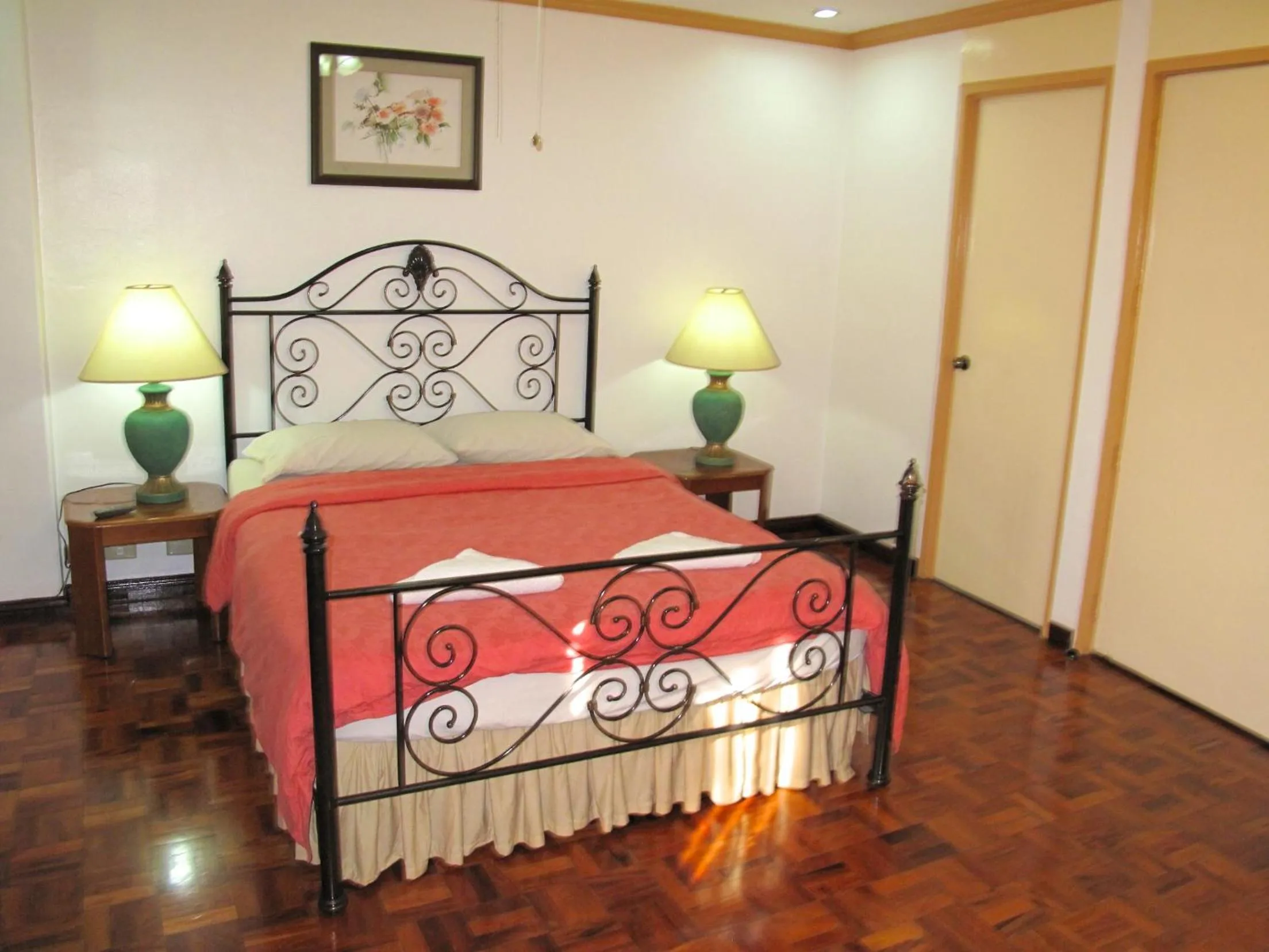 Bedroom, Bed in Makati Suites at Travelers Inn
