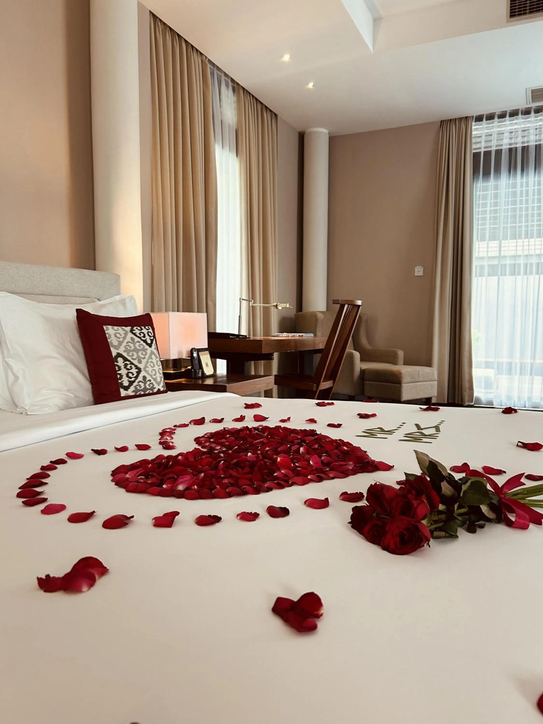 Bed in Javana Royal Villas