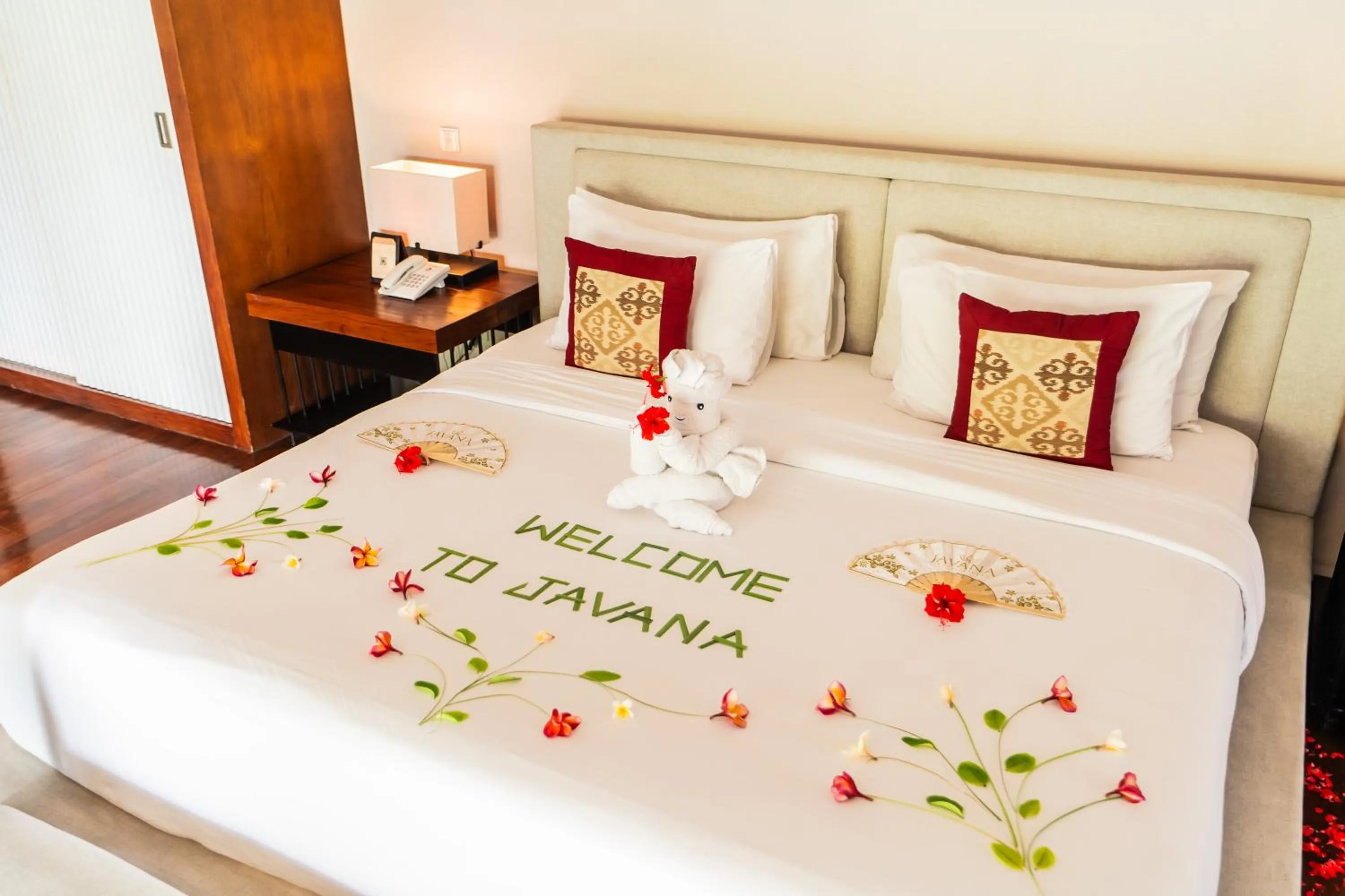 Bed in Javana Royal Villas