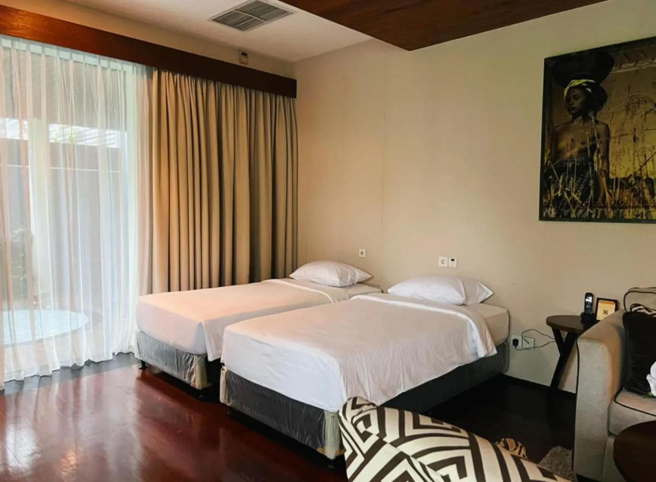 Bed in Javana Royal Villas