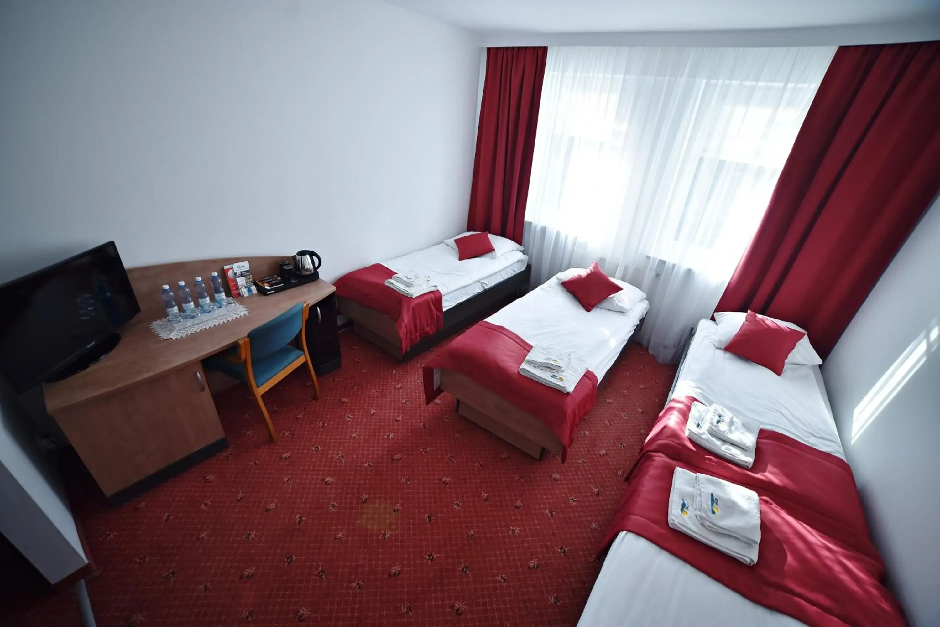 Triple Room with Private Bathroom in Zacisze Nad Nidą Resort Triple Room with Private Bathroom in Zacisze Nad Nidą Resort