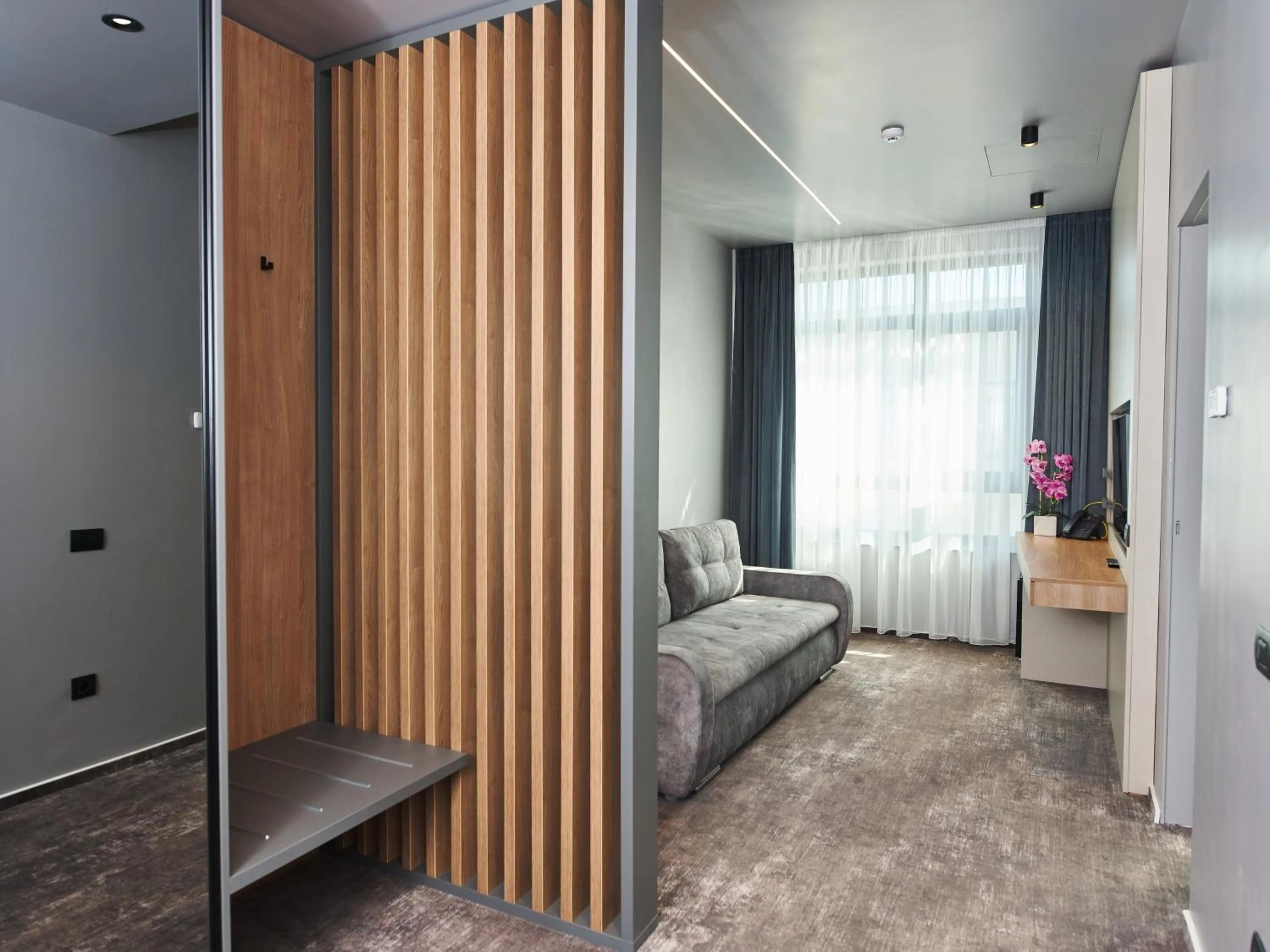 Living room, Bed in Hotel EMD