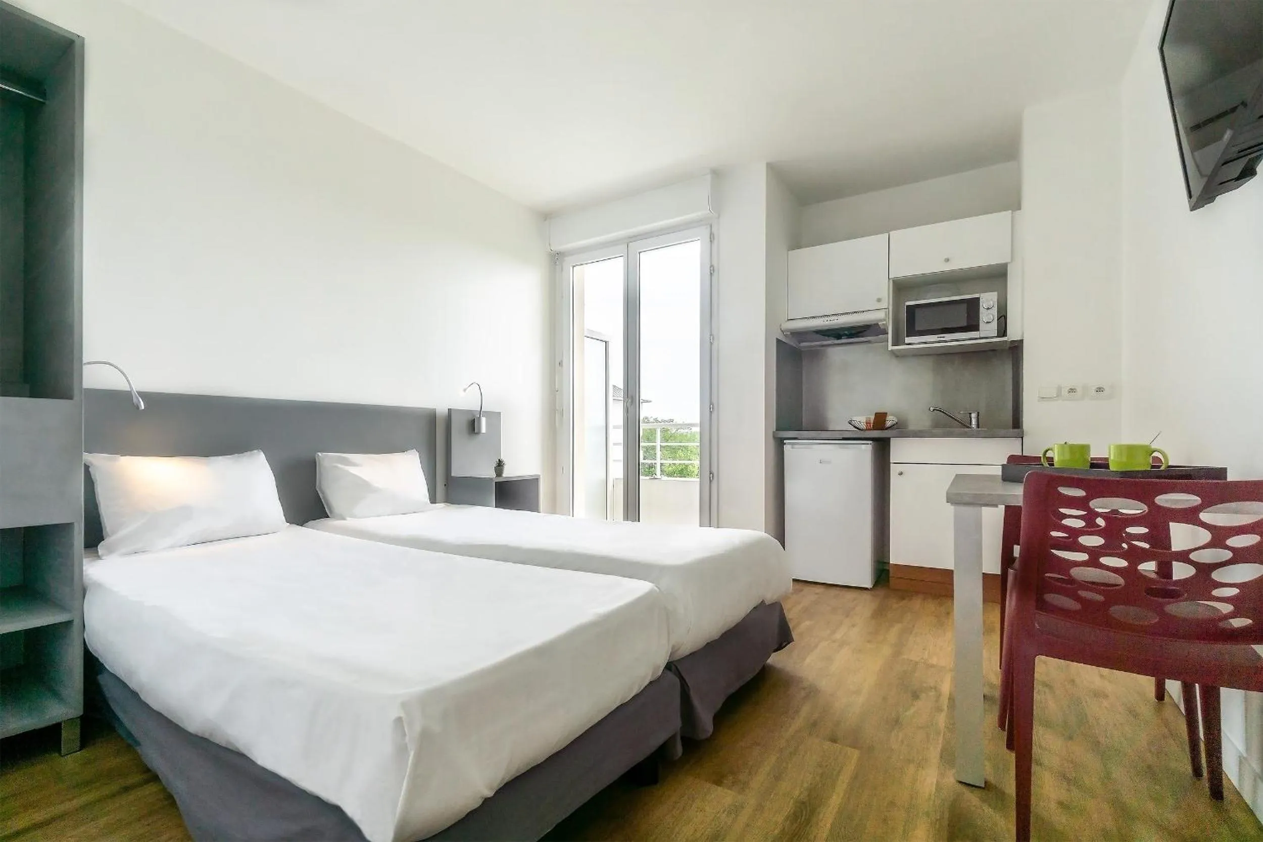 Photo of the whole room, Bed in City Résidence Chelles