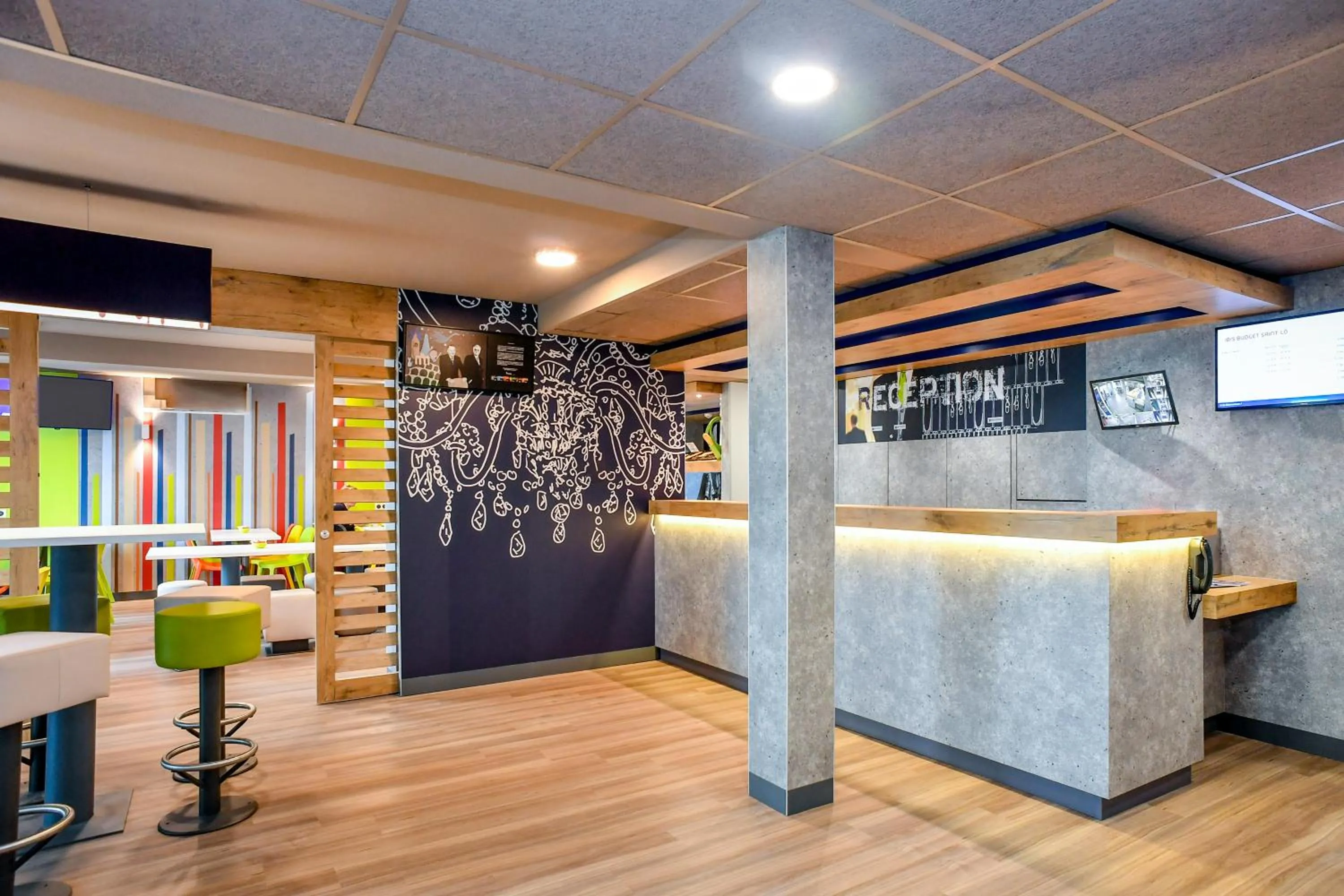 Lobby or reception in ibis budget Coutances