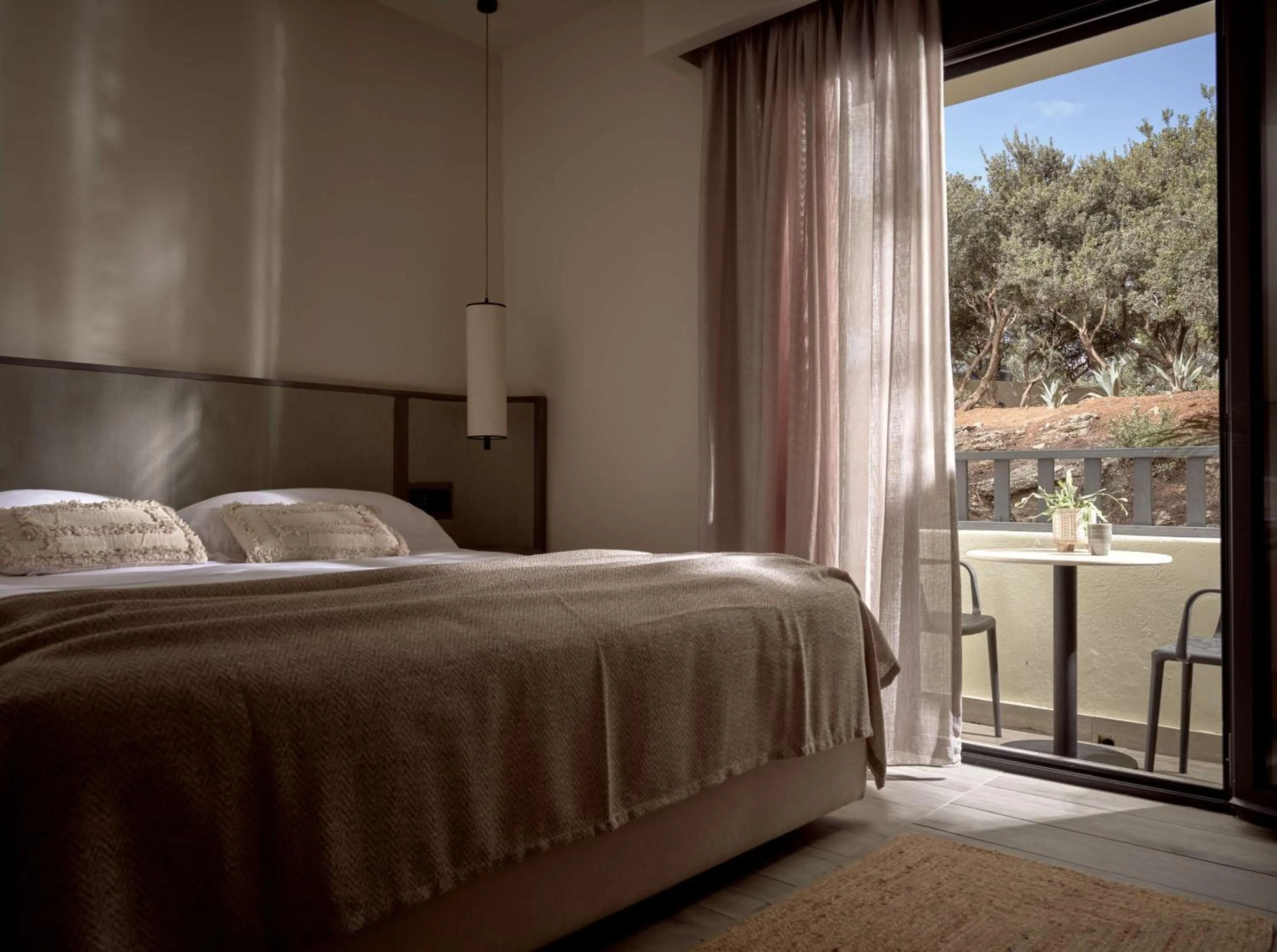 Bed in Numo Ierapetra Beach Resort Crete, Adults only, Curio Collection Hilton