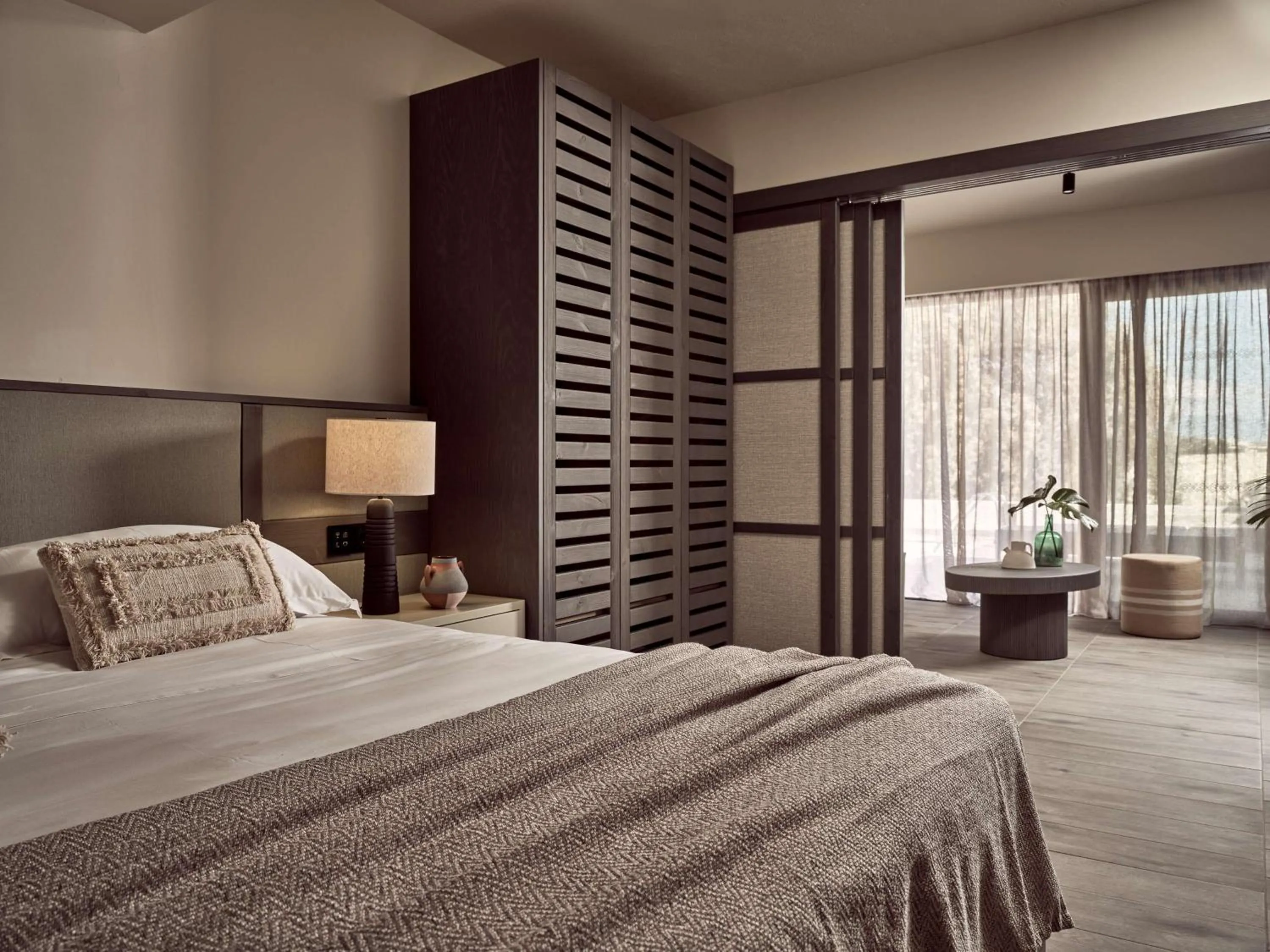 Bed in Numo Ierapetra Beach Resort Crete, Adults only, Curio Collection Hilton