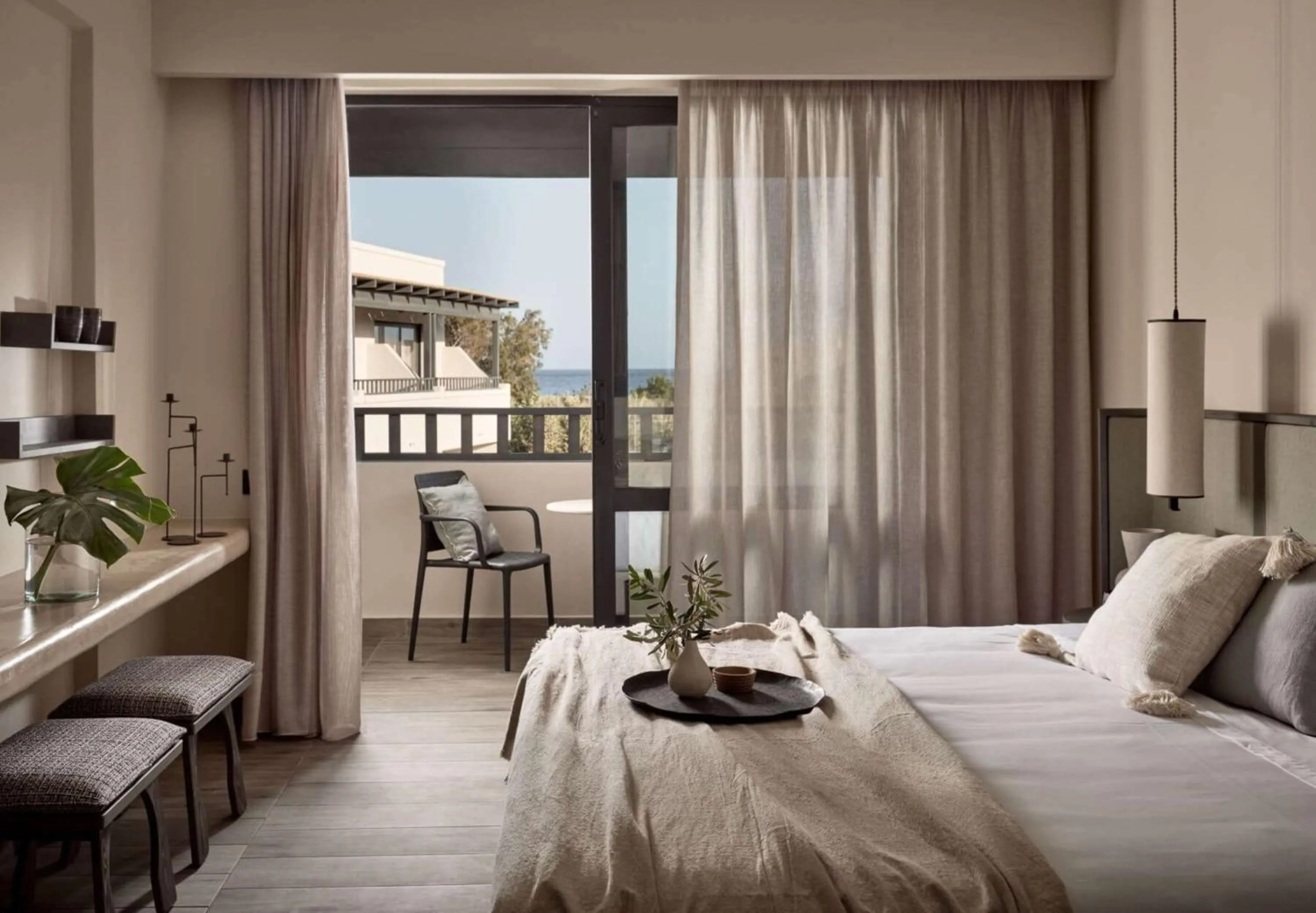 Bed in Numo Ierapetra Beach Resort Crete, Adults only, Curio Collection Hilton