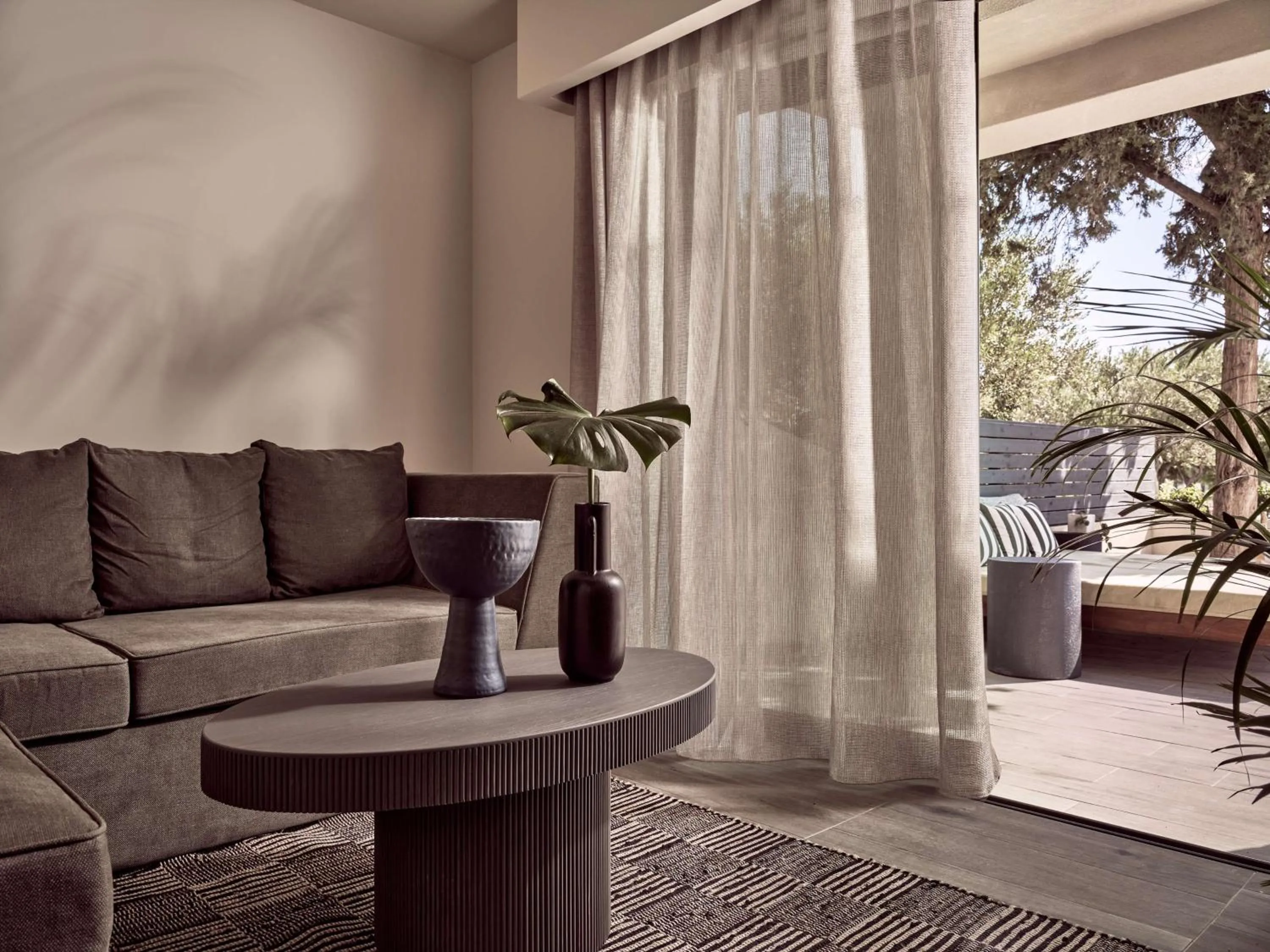 Living room in Numo Ierapetra Beach Resort Crete, Adults only, Curio Collection Hilton