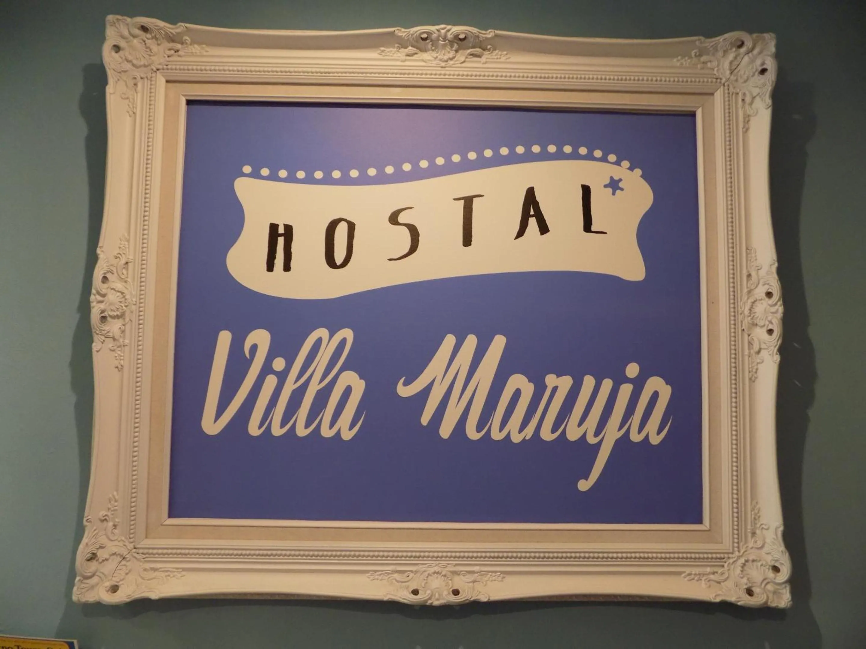 Property logo or sign in Hostal Villa Maruja