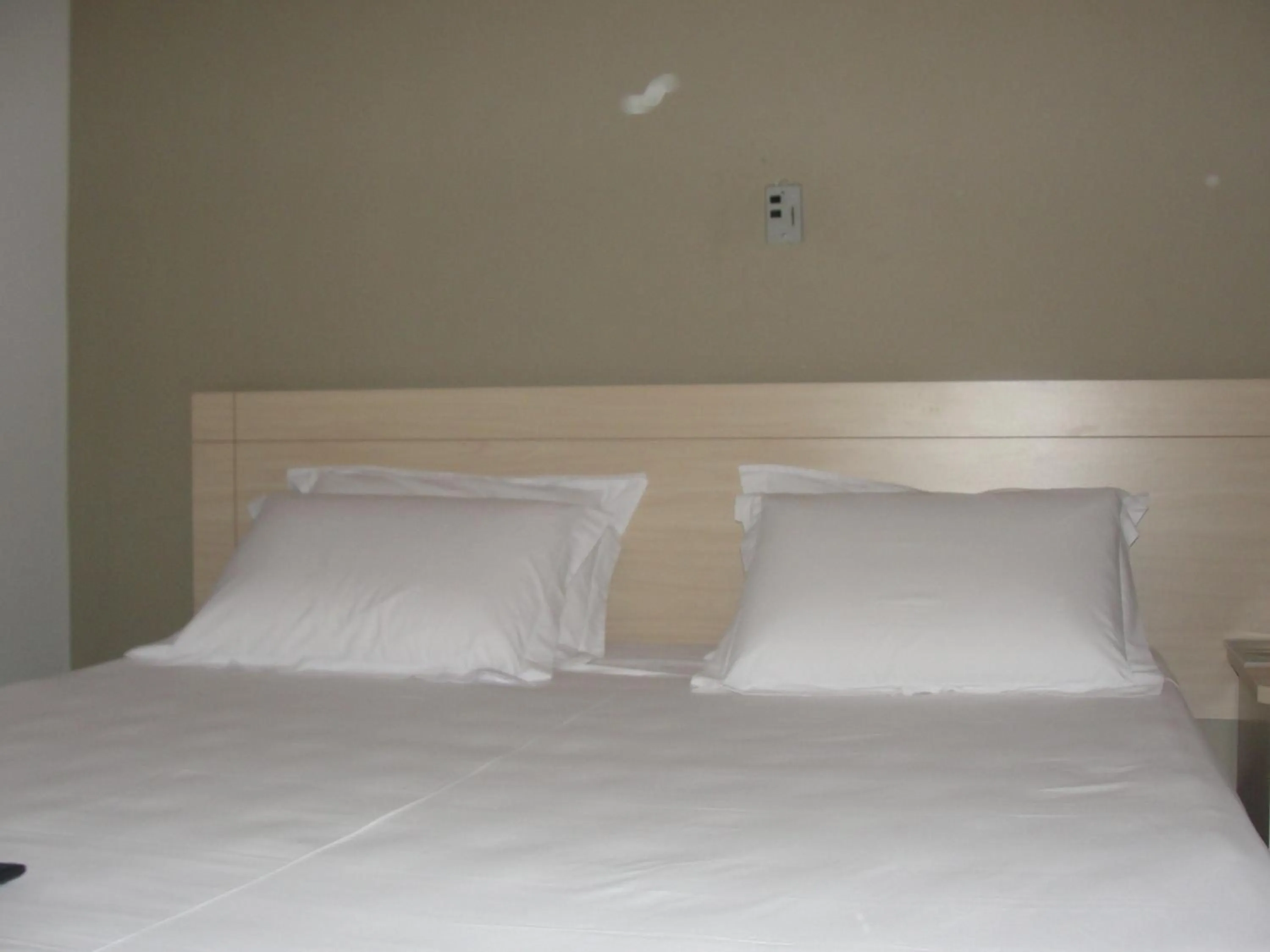 Bed in Manhuaçu Center Hotel