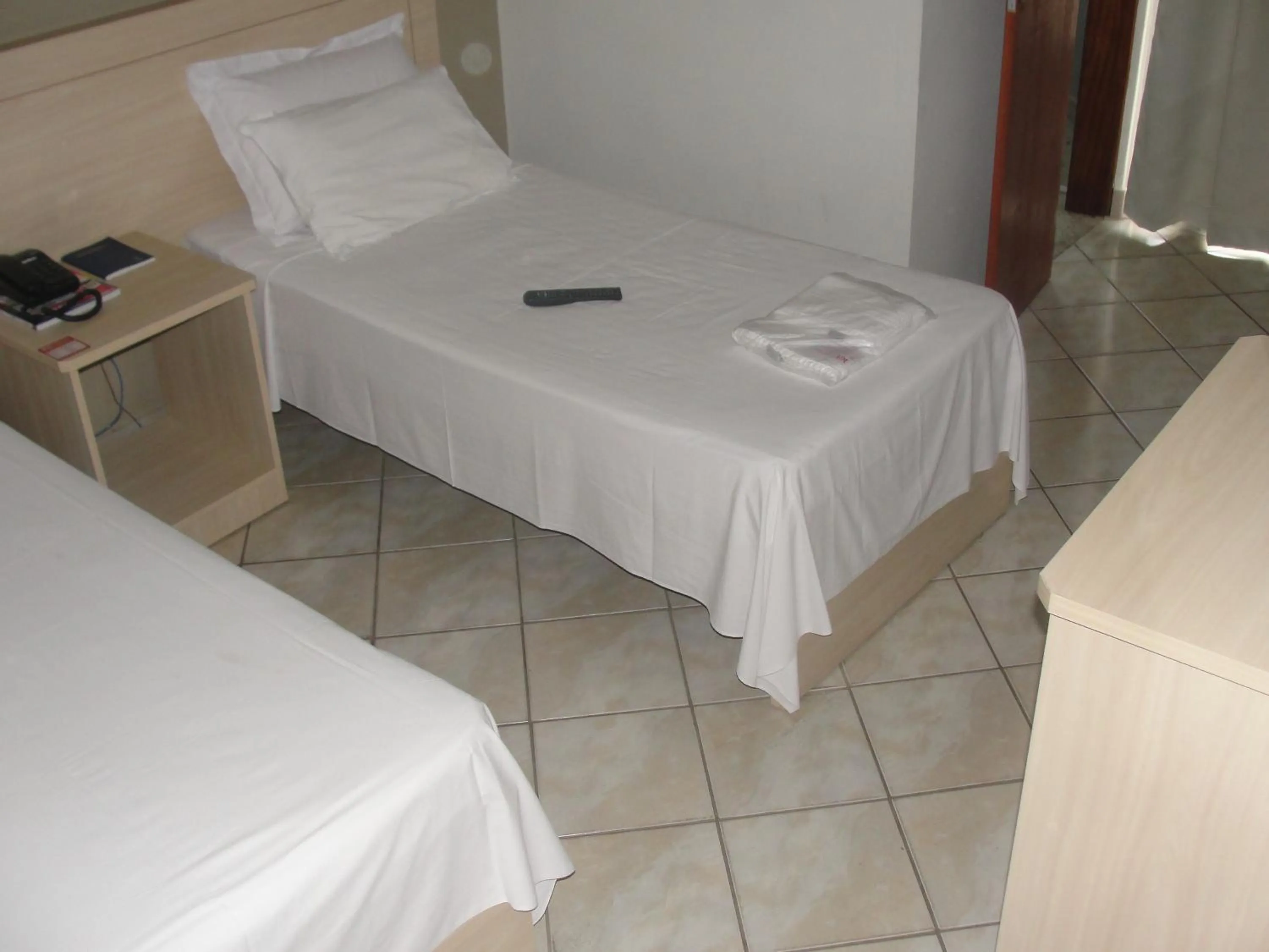 Bed in Manhuaçu Center Hotel
