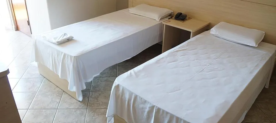 Bed in Manhuaçu Center Hotel