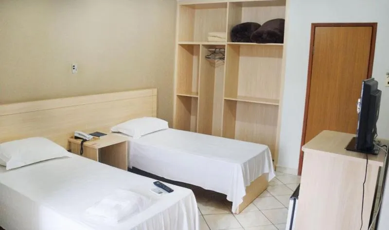 Bed in Manhuaçu Center Hotel