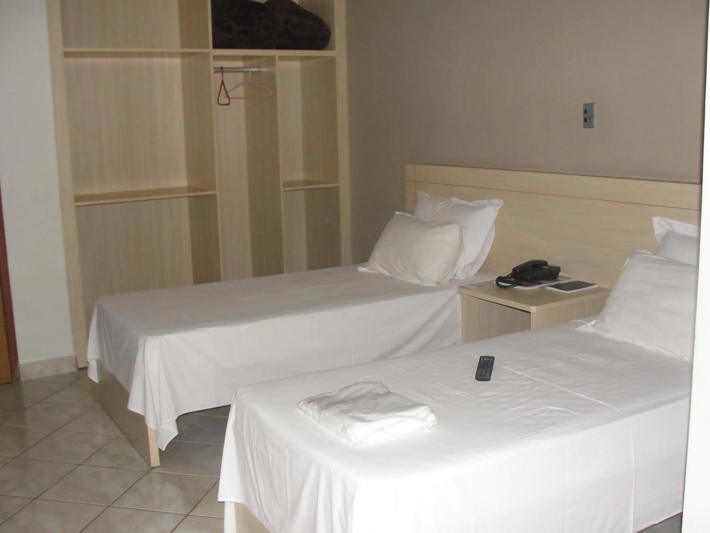 Bed in Manhuaçu Center Hotel