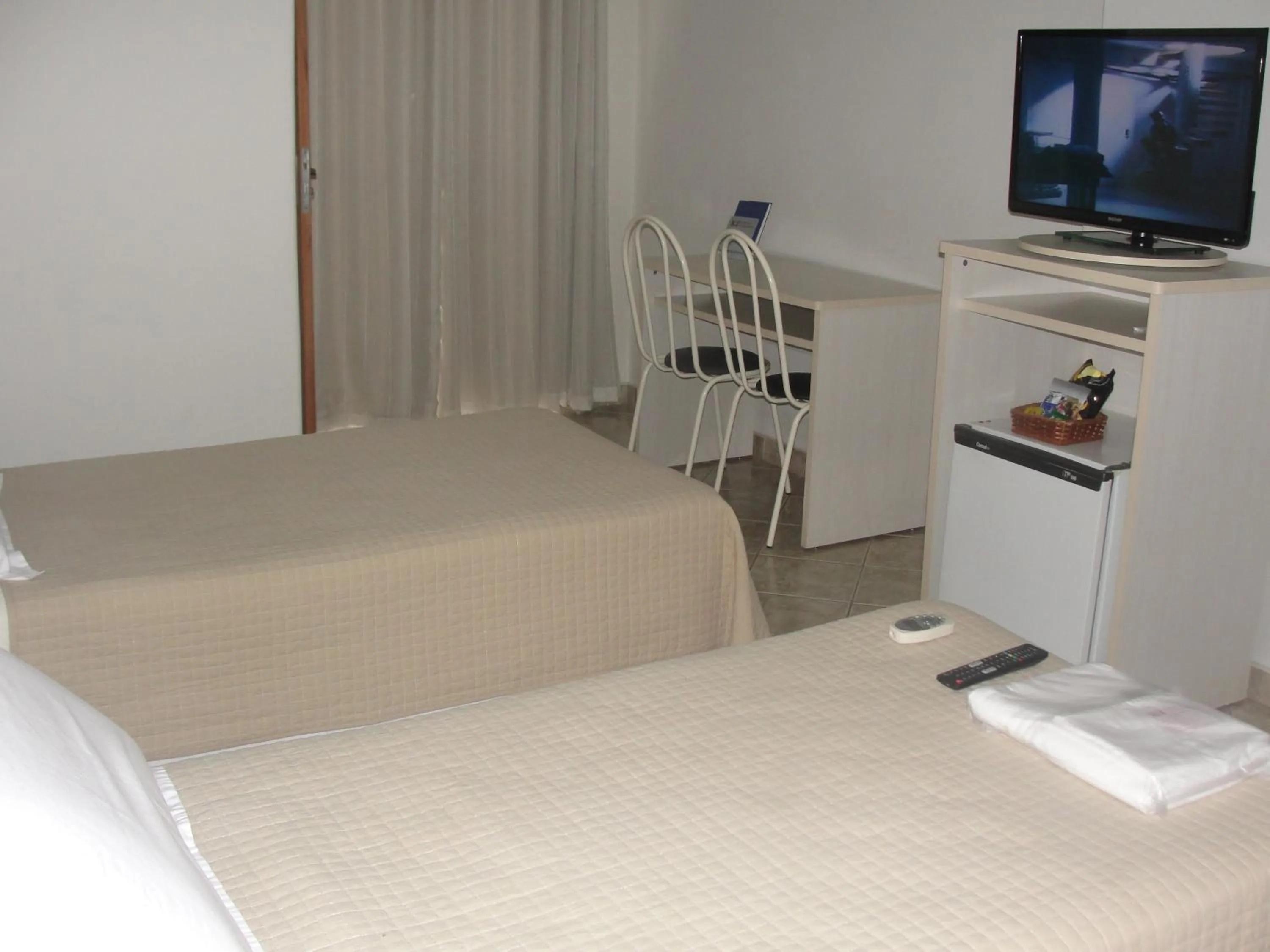 Bed in Manhuaçu Center Hotel