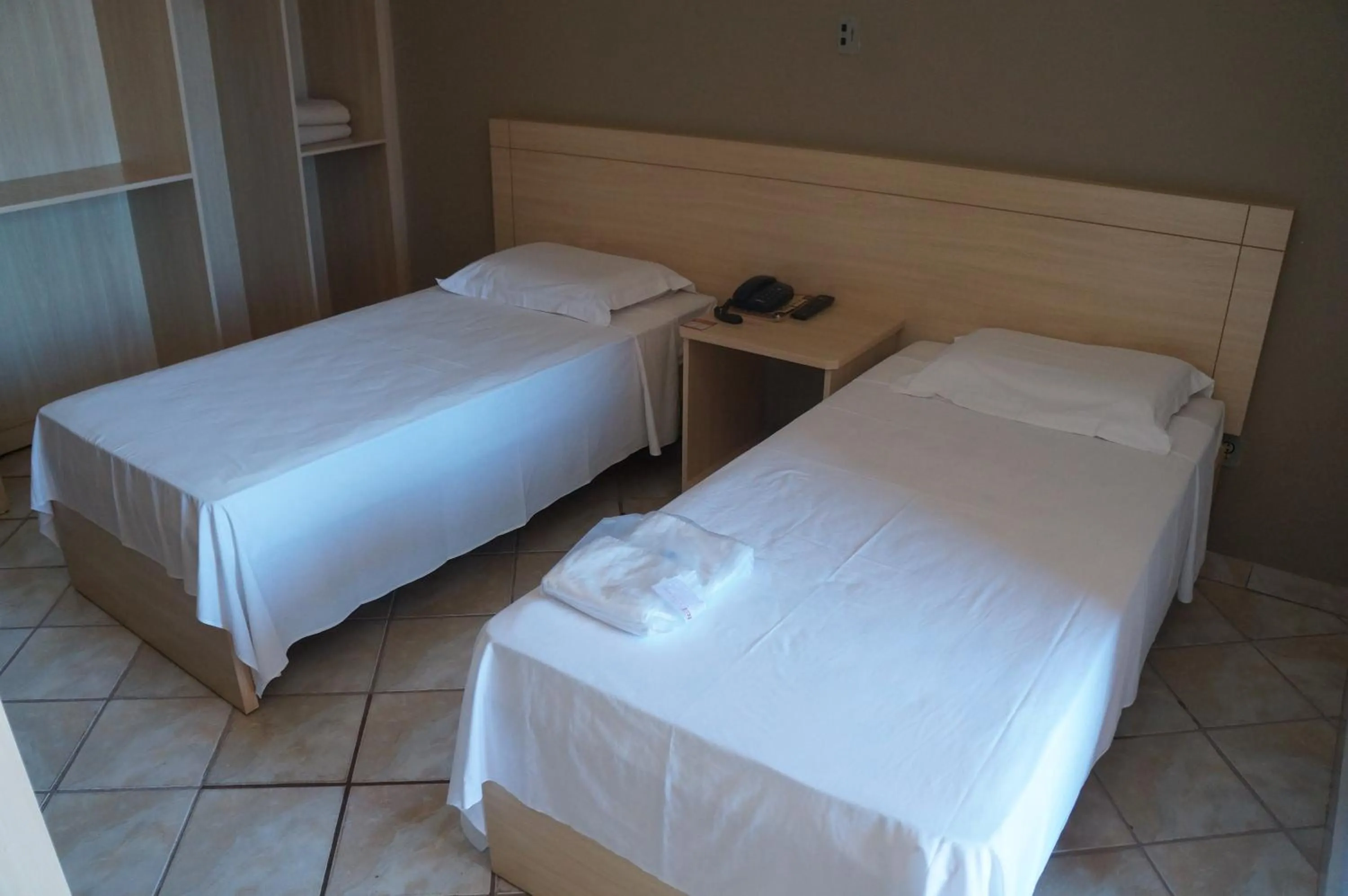 Bed in Manhuaçu Center Hotel