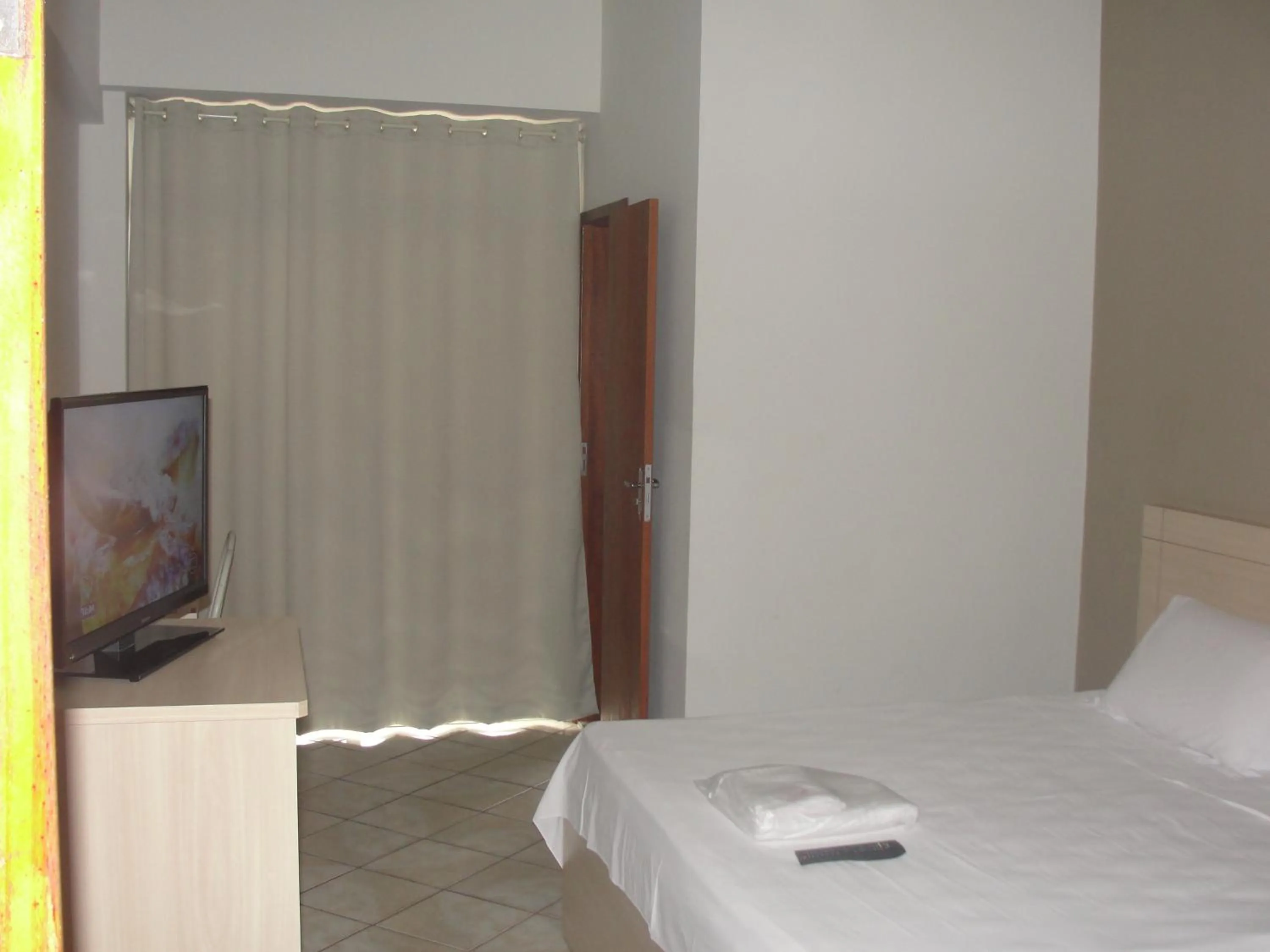 Bed in Manhuaçu Center Hotel