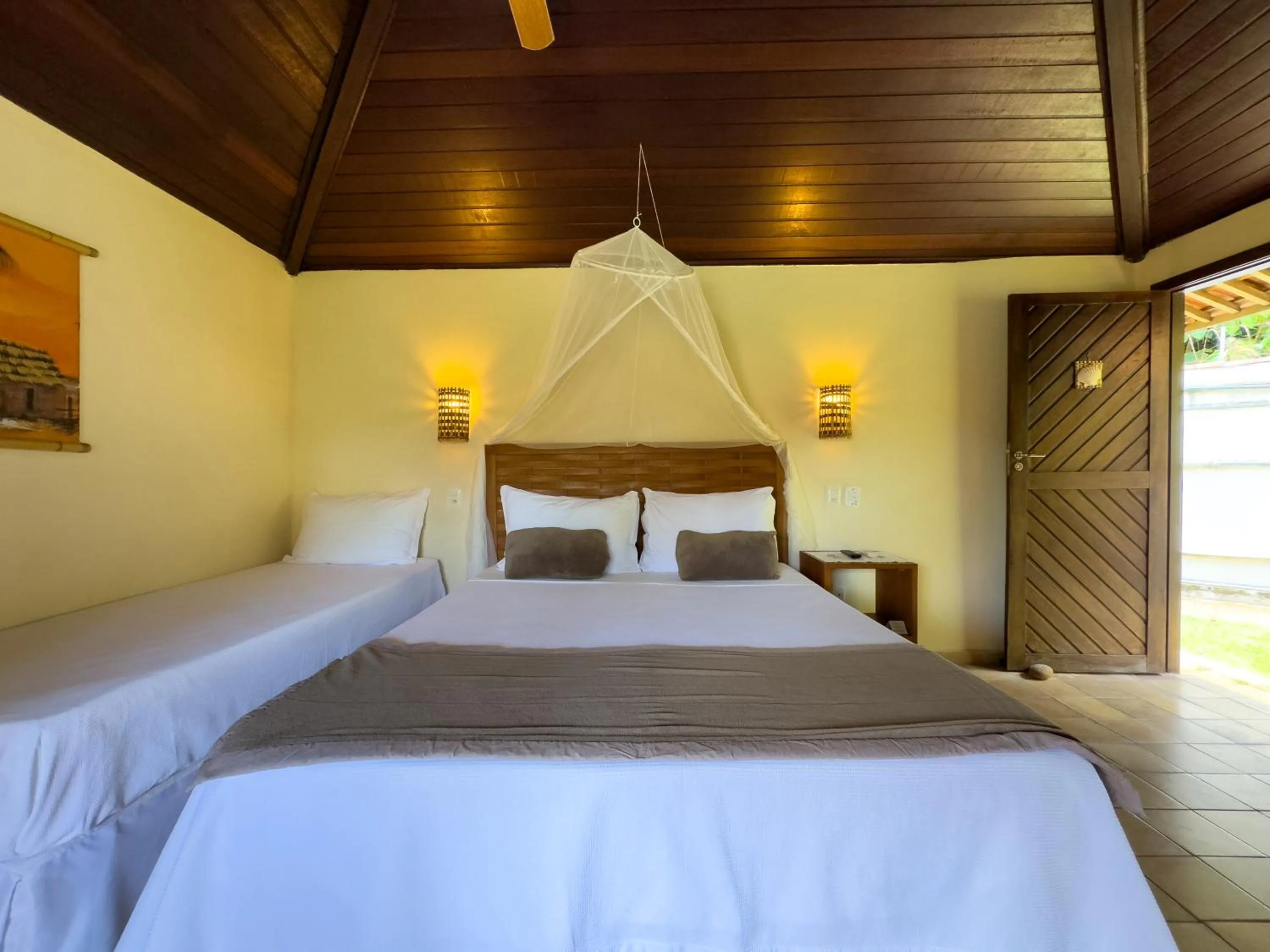 Bed in Pousada Berro do Jeguy