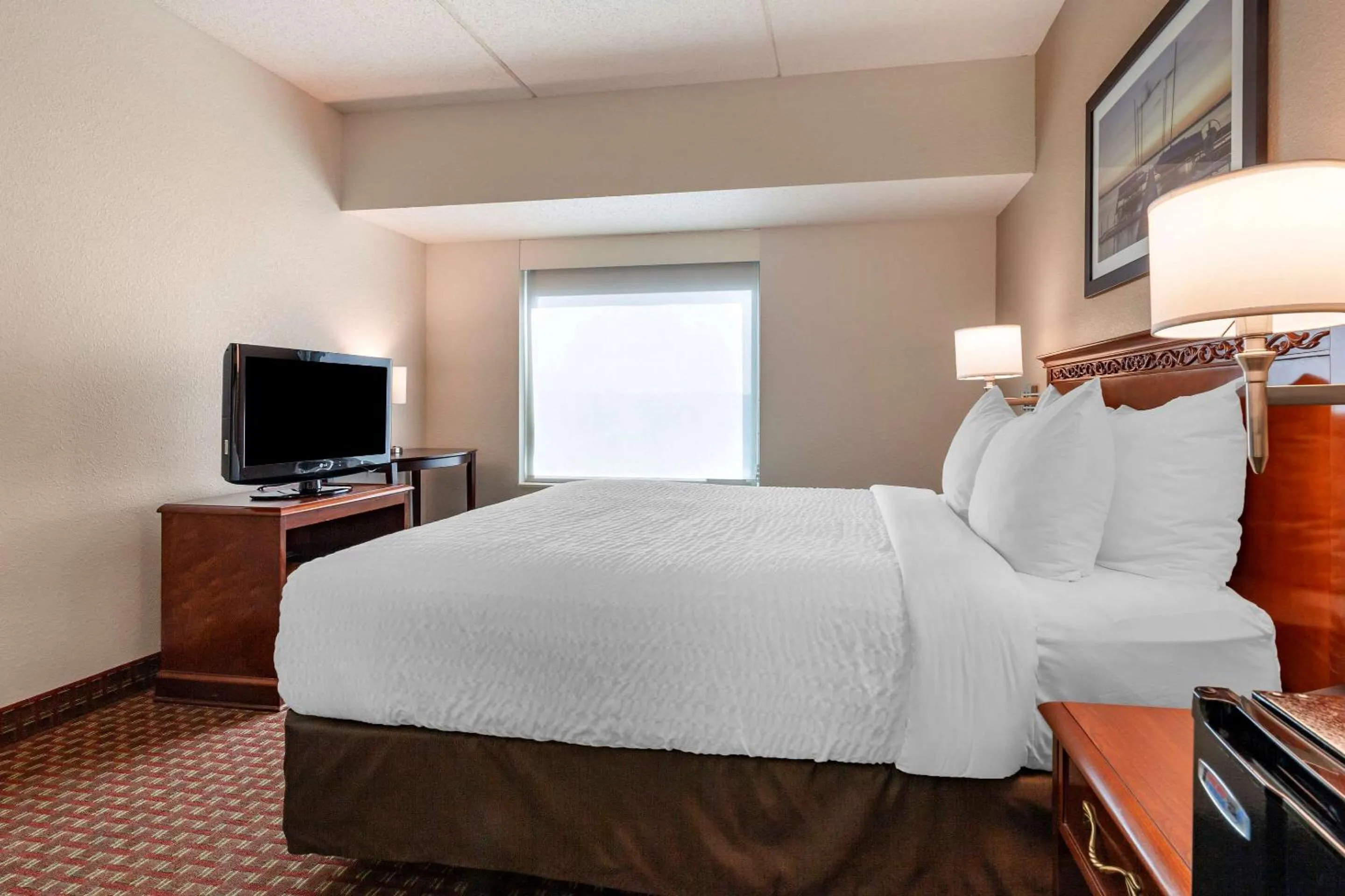 Bedroom in Clarion Suites at The Alliant Energy Center