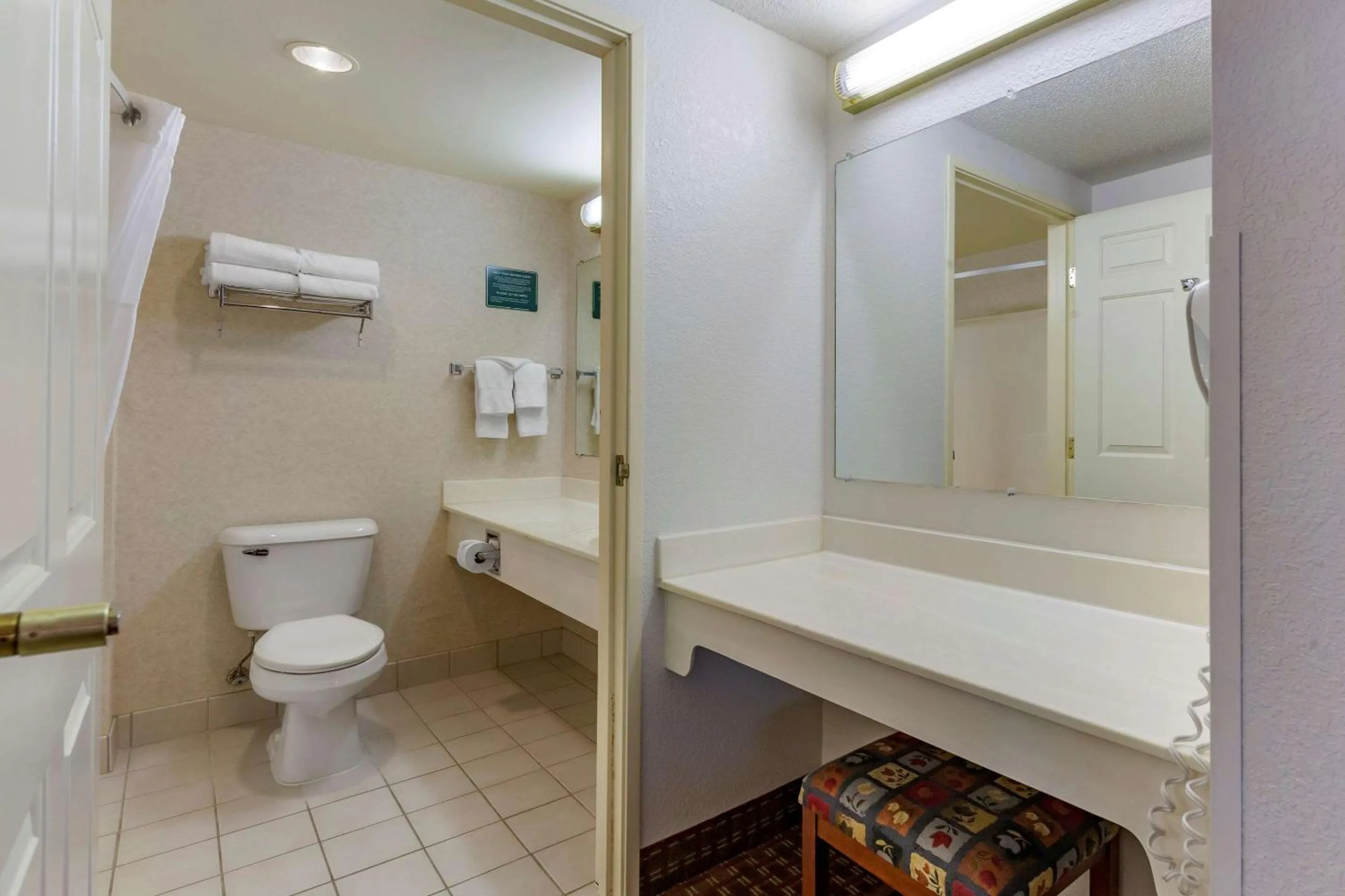 Bedroom in Clarion Suites at The Alliant Energy Center