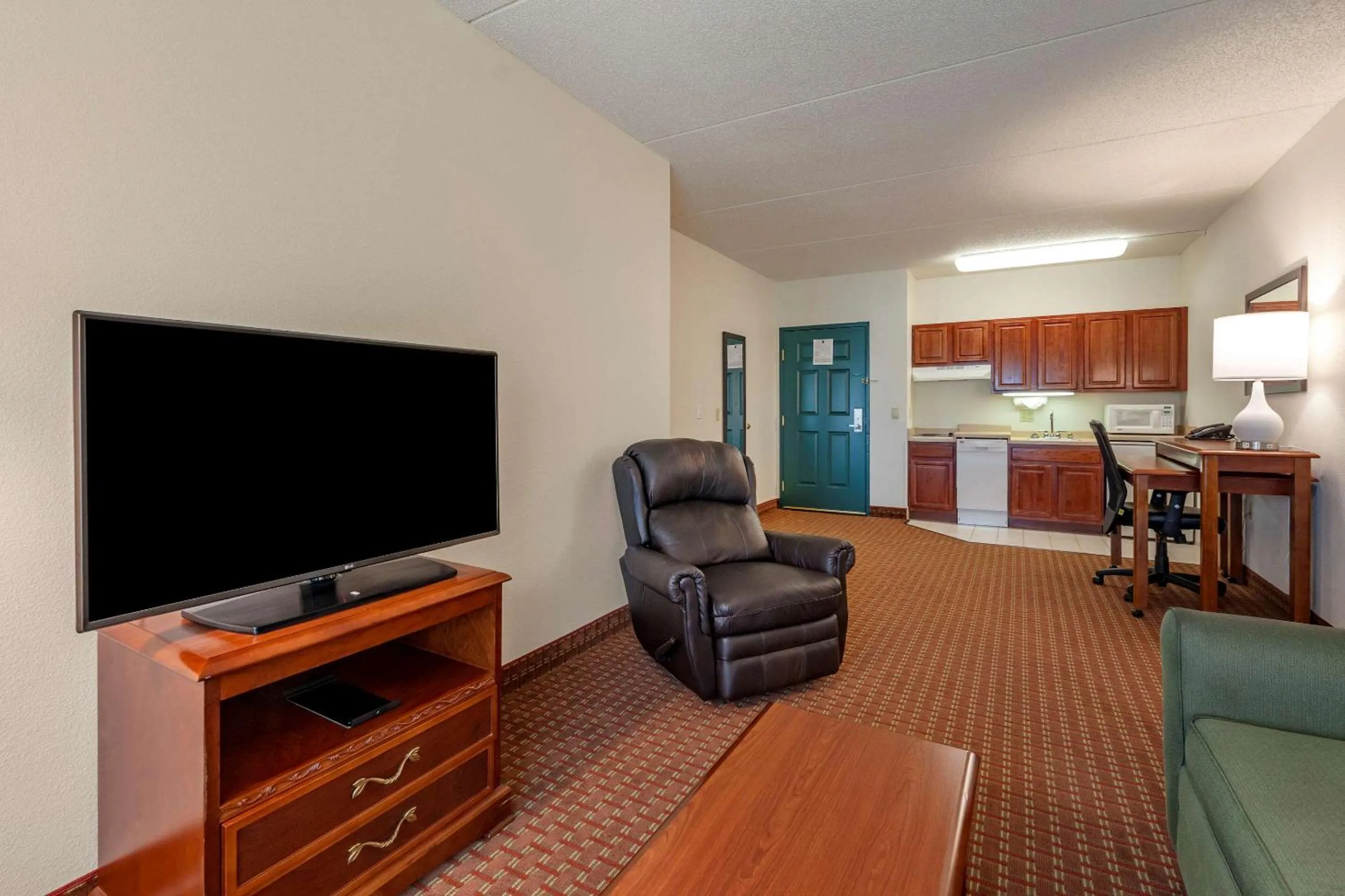 Bedroom in Clarion Suites at The Alliant Energy Center