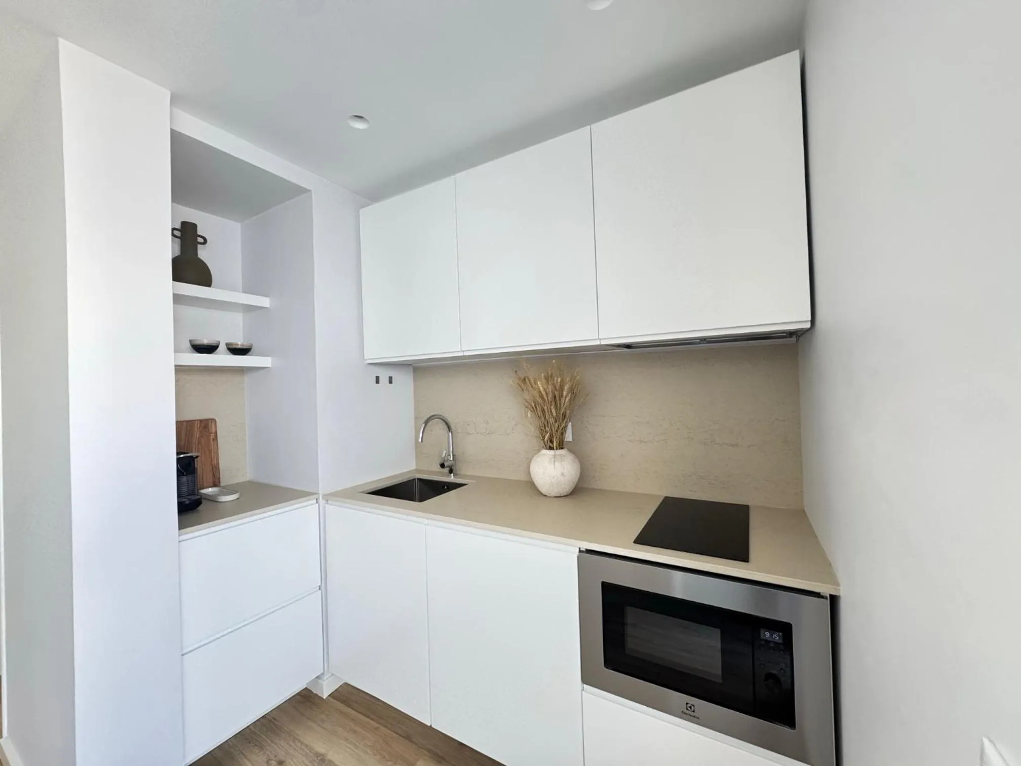 Kitchen or kitchenette in Apartamentos Rossio Mar