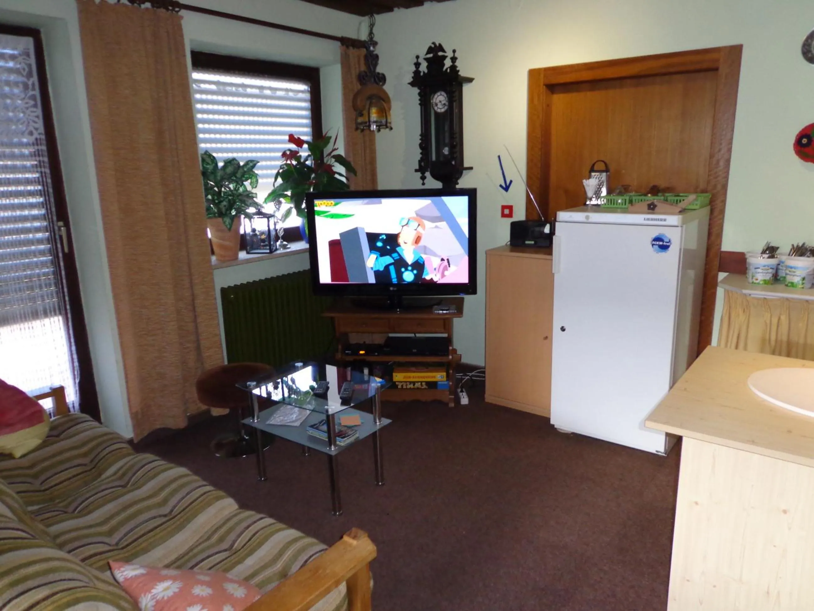 Communal lounge/ TV room in Pension Schamberger